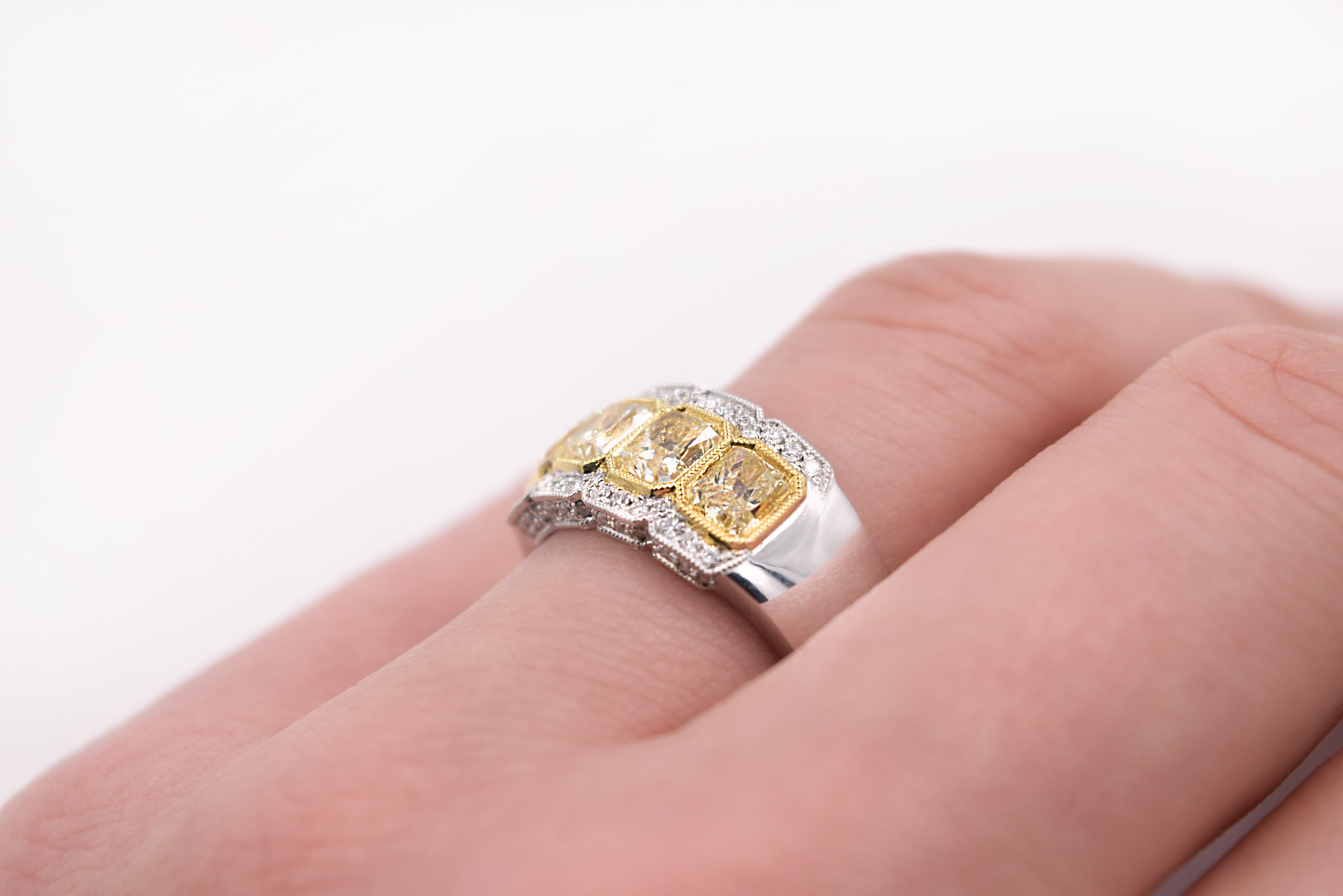 Women's 2.38 Carat Fancy Yellow Radiant Cut Four-Stone Diamond Ring in 18 Karat Gold For Sale