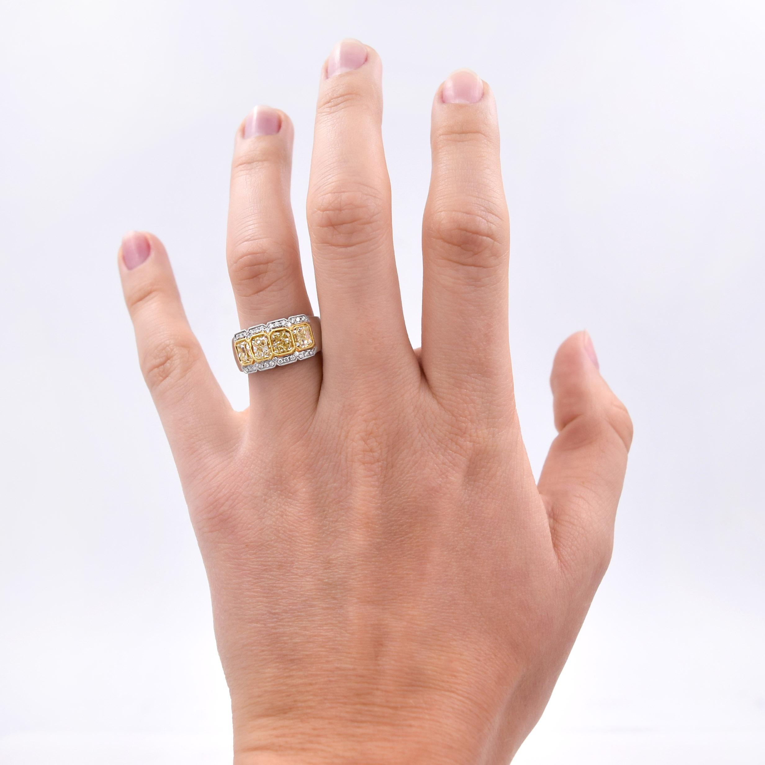 2.38 Carat Fancy Yellow Radiant Cut Four-Stone Diamond Ring in 18 Karat Gold For Sale 1