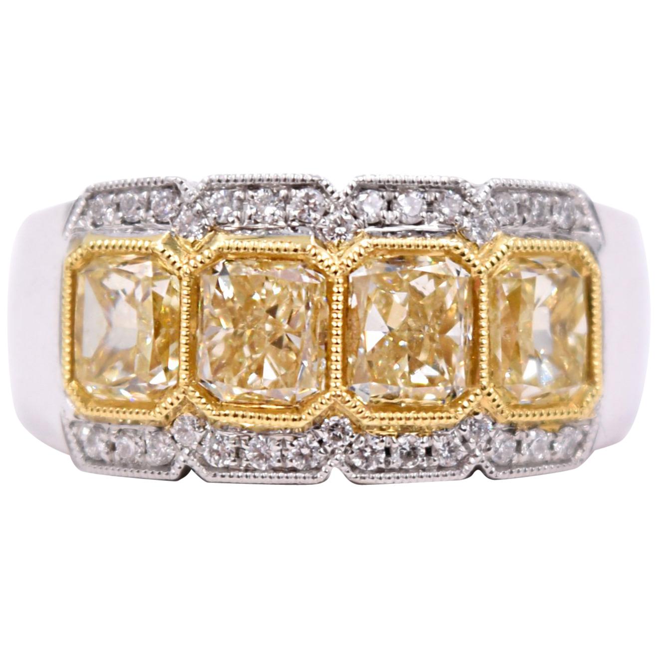 2.38 Carat Fancy Yellow Radiant Cut Four-Stone Diamond Ring in 18 Karat Gold For Sale