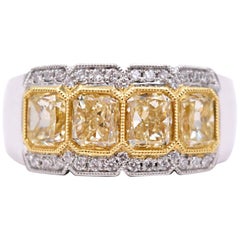 2.38 Carat Fancy Yellow Radiant Cut Four-Stone Diamond Ring in 18 Karat Gold