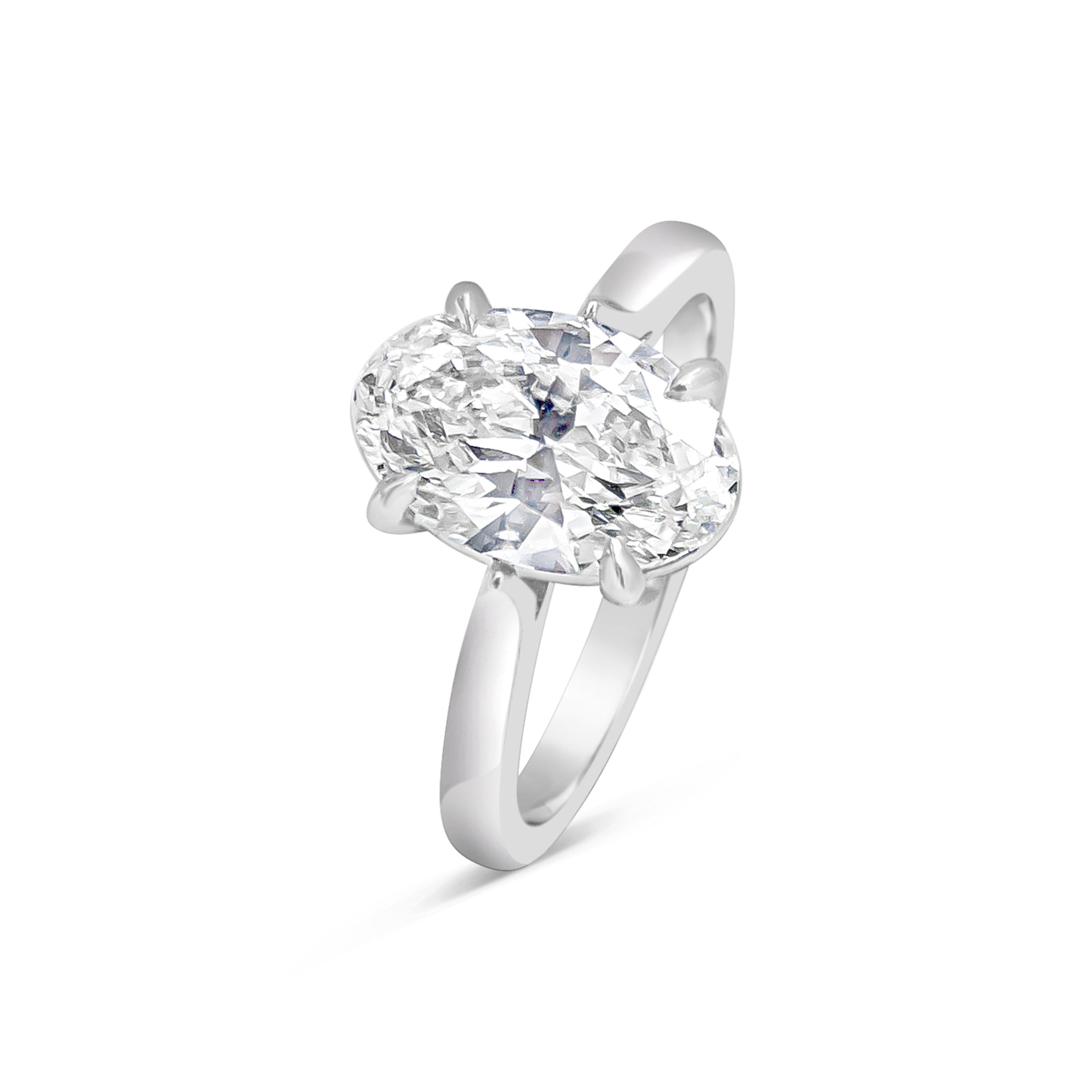 A simple and timeless engagement ring style showcasing a gorgeous 2.38 carat oval cut diamond in a rounded and comfort fit platinum composition. 

Style available in different price ranges. Prices are based on your selection of the 4C’s (Carat,