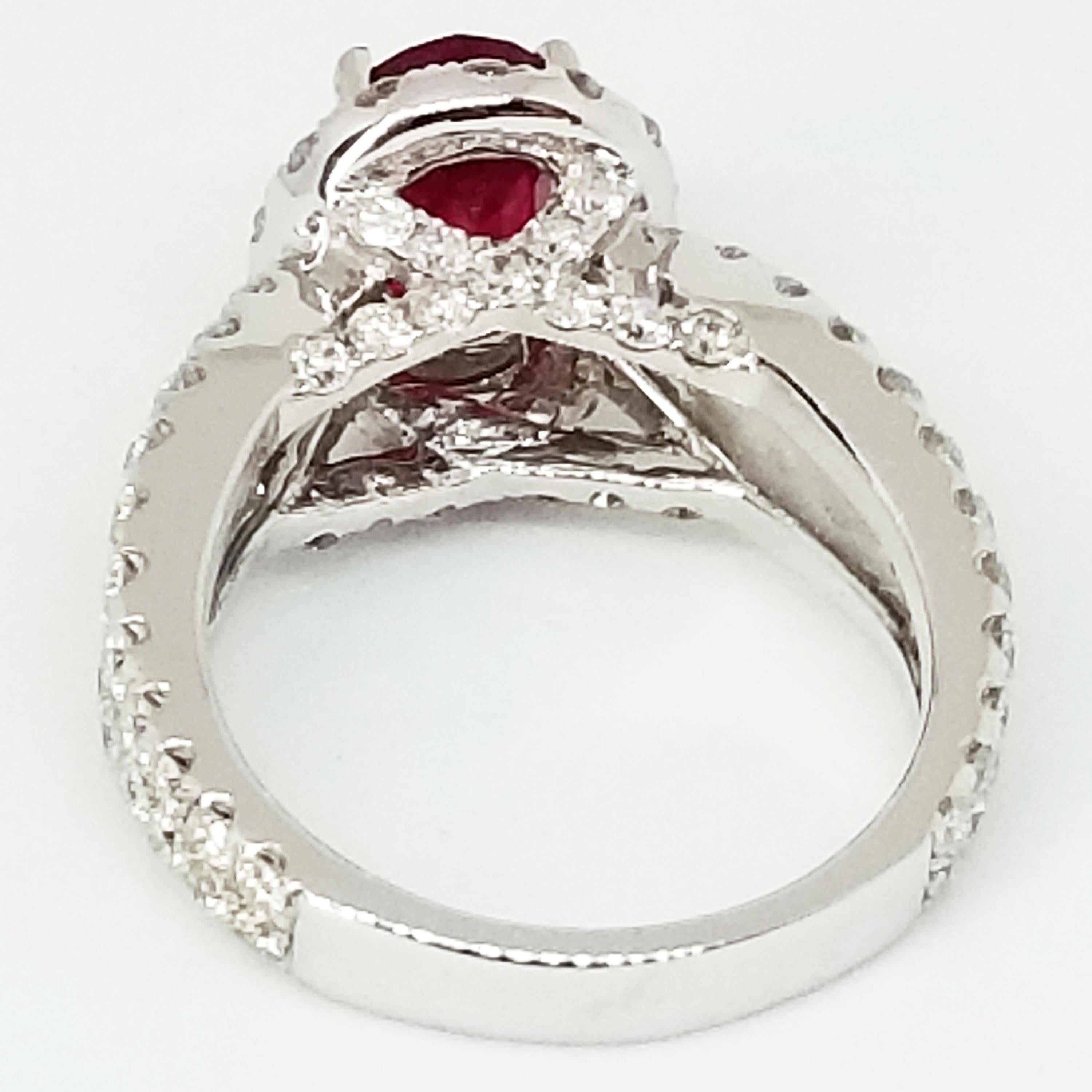 Oval Cut 2.38 Carat Oval Ruby 1.81 Carat Diamond Halo Ring Woven Shoulders White Gold For Sale