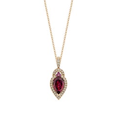 Sunita Nahata 2.38 Carat Rhodolite Pendant in 18KRG with White Diamond.