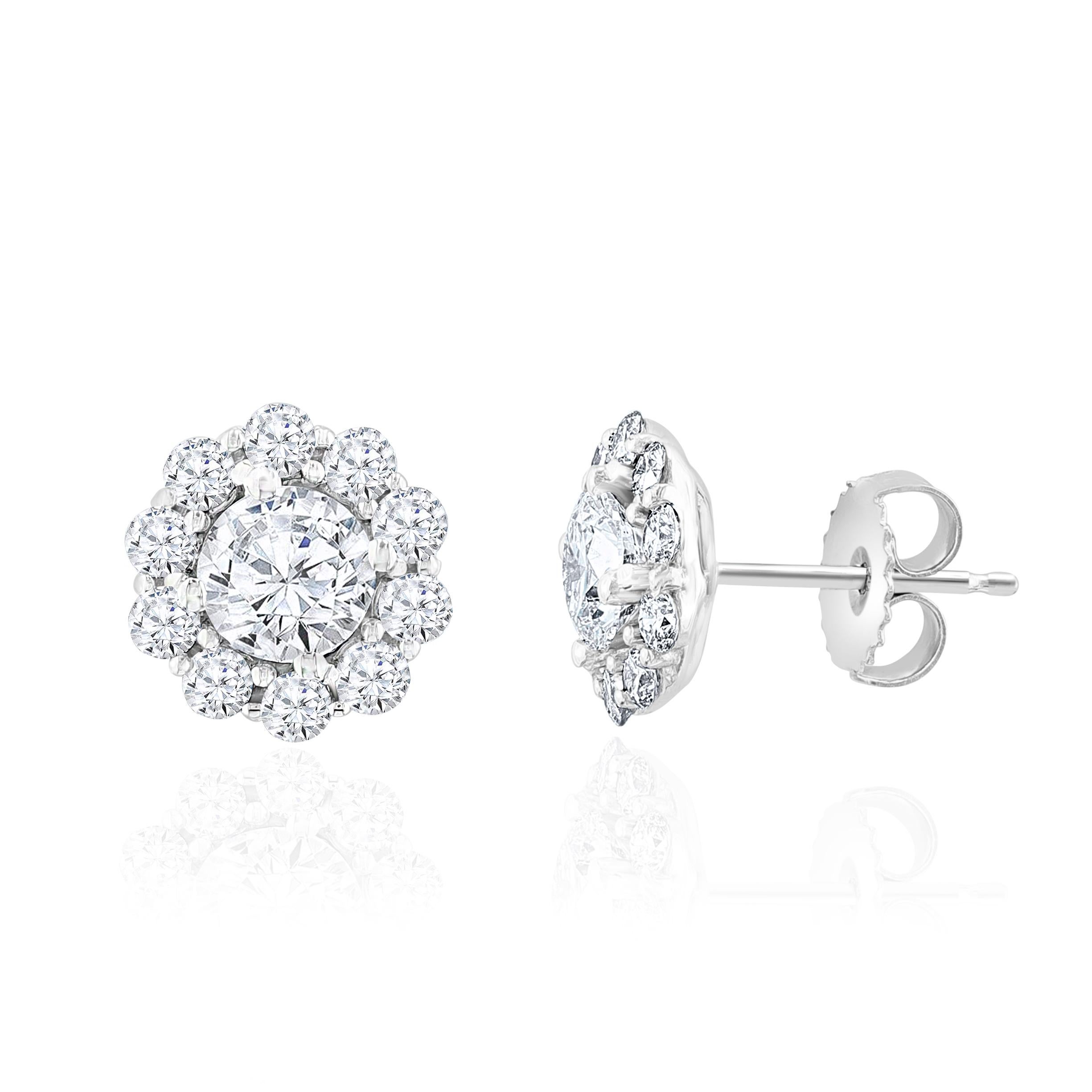 2.38 Carat Diamond Cluster Earrings.

Set in 18 Karat White Gold.
Diamonds are of H color and SI Clarity.
