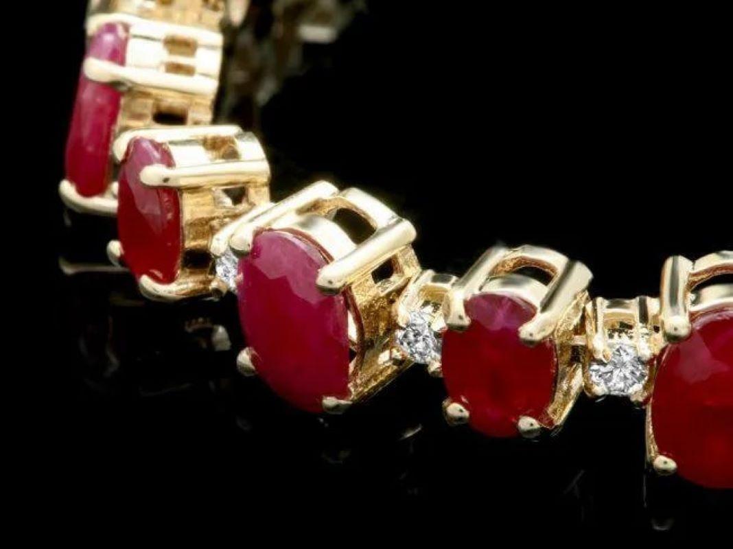 23.80Ct Natural Red Ruby and Diamond 14K Solid Yellow Gold Bracelet

Total Natural Ruby Weight is: 22.90 carats 

Ruby  Measures: Approx. 6x4 - 7x5 mm

Ruby treatment: Fracture Filling

Total Natural Round Diamonds Weight: 0.90 Carats (color G-H /