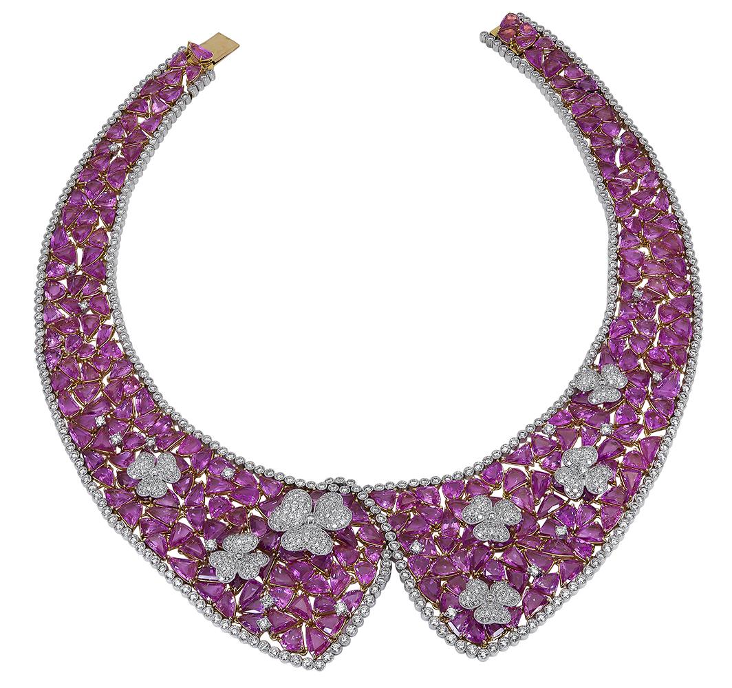 A rare and important piece of jewelry showcasing an astounding 238.27 carats of mixed cut pink sapphires, elegantly set in an open-work collar design. Each pink sapphire is carefully cut and matched to fit seamlessly in the collar design. Finished