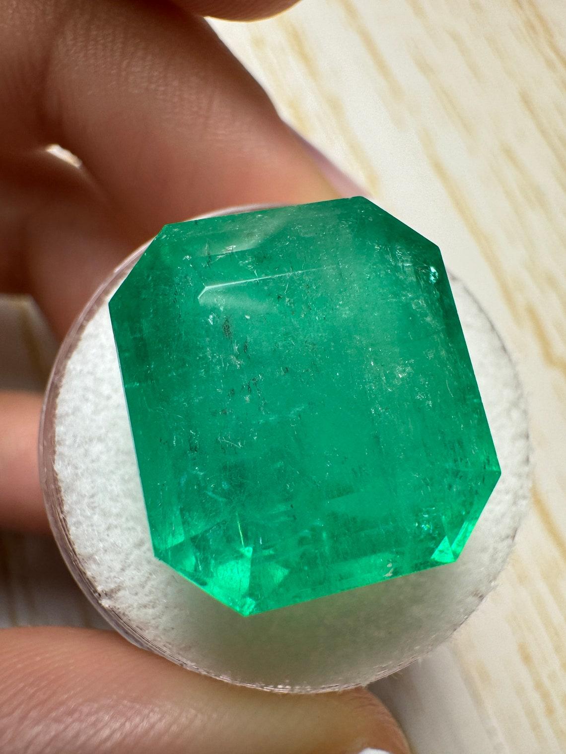 Modern 23.85 Carat 17x15.6 Huge Loose Colombian Emerald - Emerald Cut Muzo Green May For Sale
