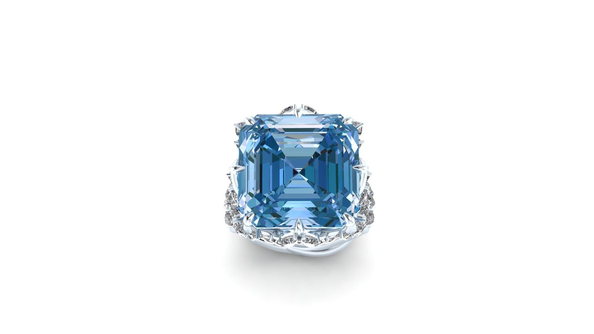 23.88 carat Natural Blue Ascher cut Aquamarine gemstone, of a high quality intense blue, transparent mineral with no inclusions, perfect choice for collectors or to commission a custom, unique piece of jewelry with it.
The ring is conceived either