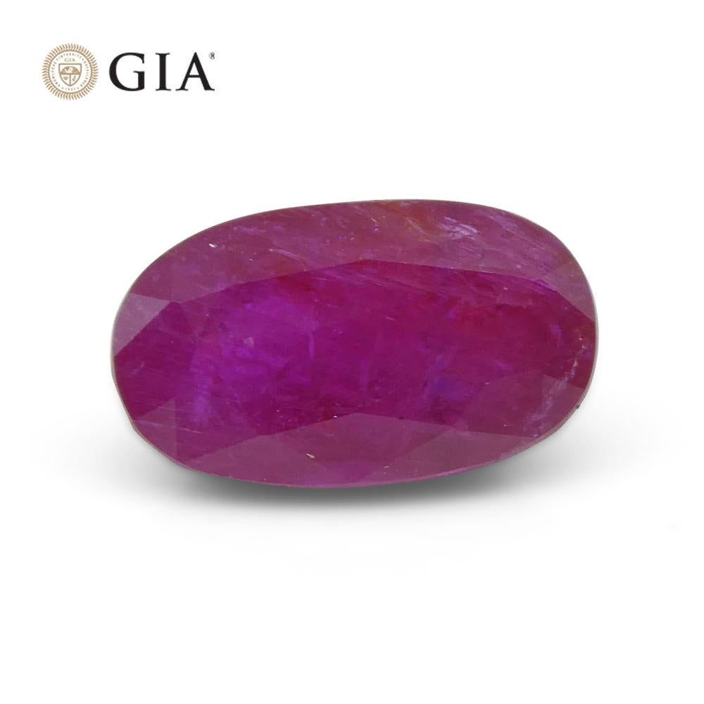 Rubino ovale rosso violaceo 2.38ct GIA certificato Tajikistan non riscaldato in vendita 4