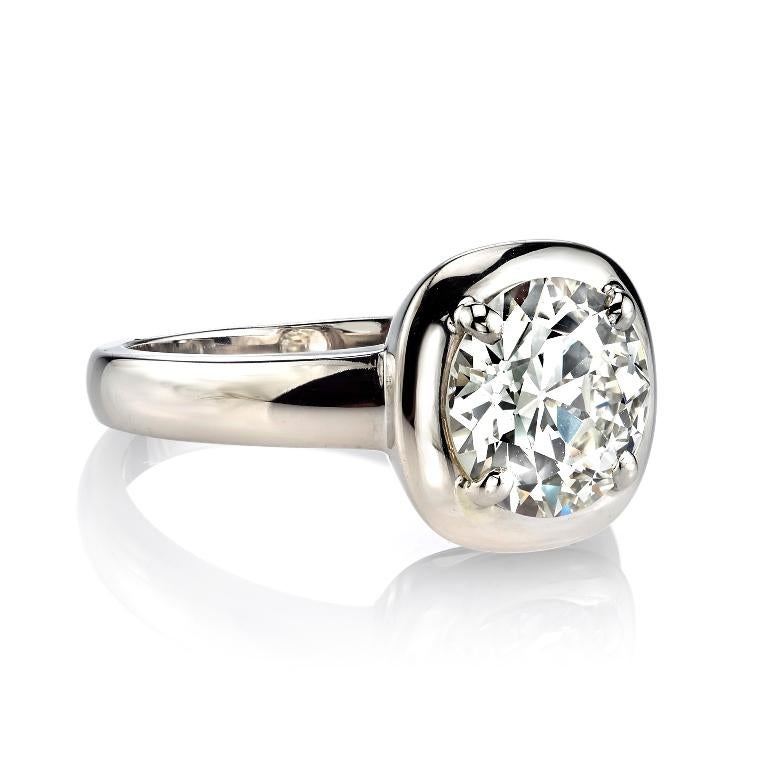 2.38ctw QR/VS1 old European cut diamond EGL certified and set in a handcrafted 18k white gold mounting.  A chic, contemporary ring in a bold yet classic design.