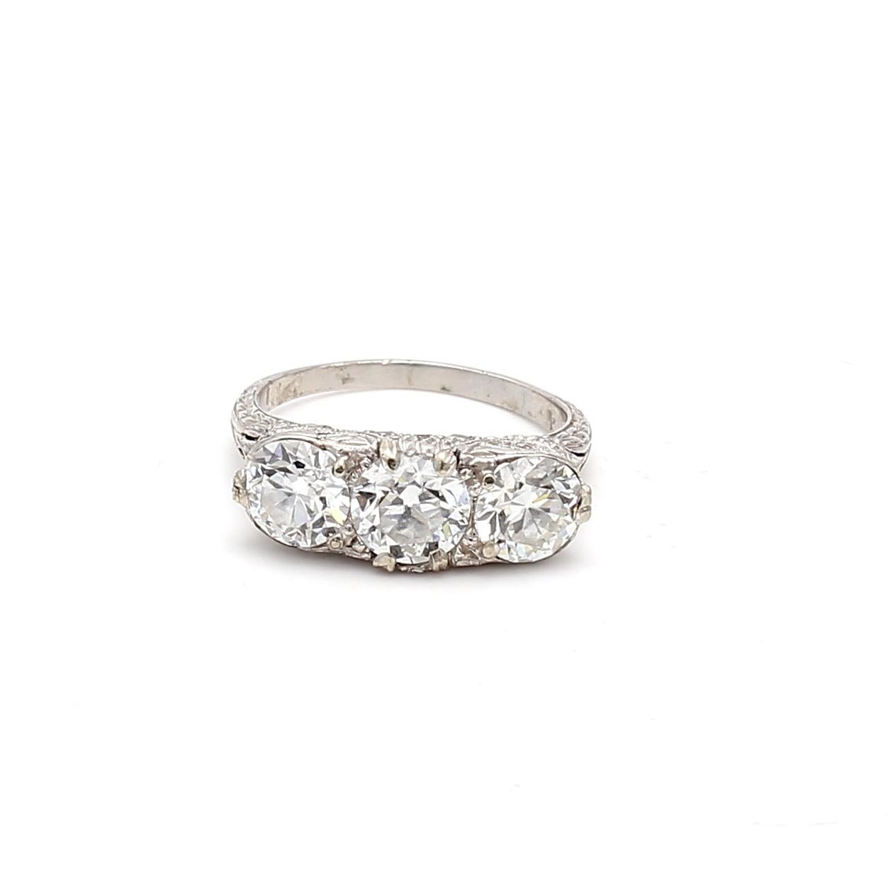 2.39 Carat Circular Brilliant Cut and Round Diamond Platinum Three-Stone Ring For Sale 5