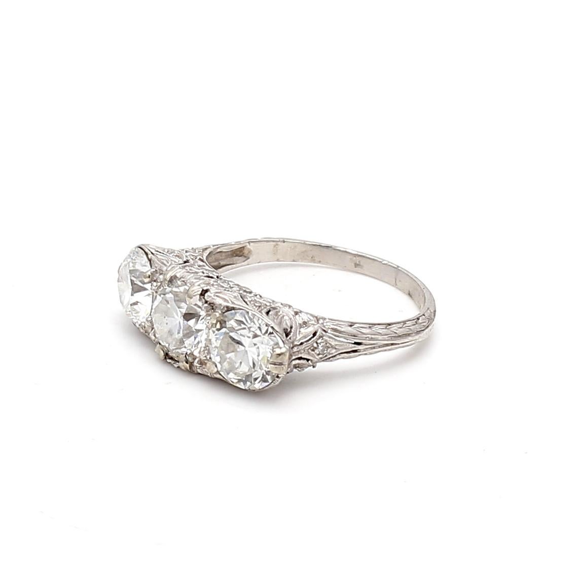 2.39 Carat Circular Brilliant Cut and Round Diamond Platinum Three-Stone Ring For Sale 4