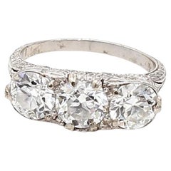 2.39 Carat Circular Brilliant Cut and Round Diamond Platinum Three-Stone Ring