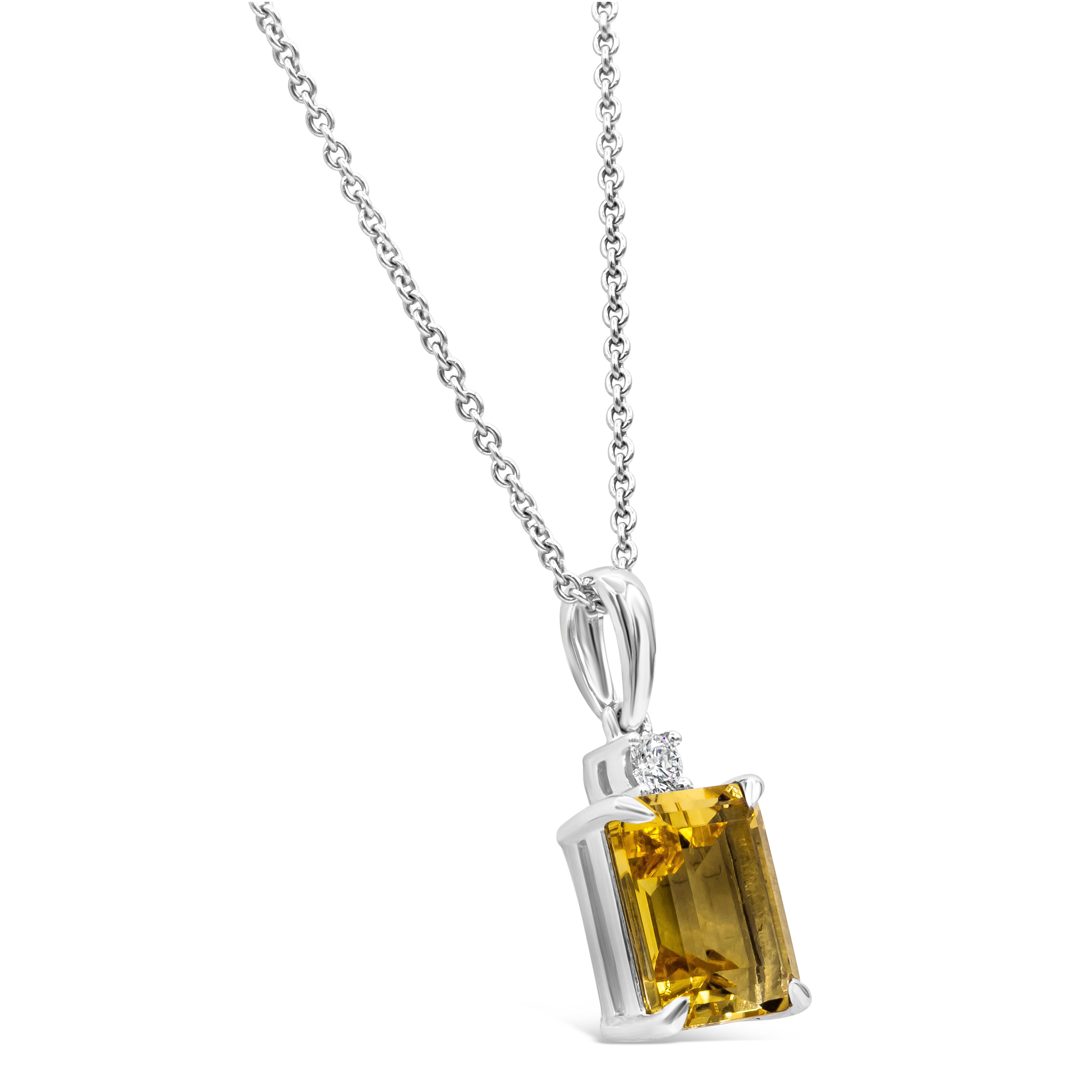 A simple pendant necklace showcasing a 2.39 carat emerald cut citrine, accented by a single round diamond on top of the center stone. Made in 18 karat white gold. Suspended on a 16 inch chain (adjustable upon request).

