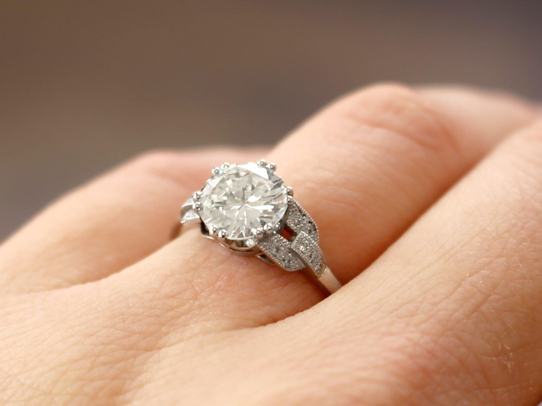 A stunning, fine and impressive 2.39 Carat diamond and platinum solitaire engagement ring; part of our diverse jewelry and estate jewelry collections.

This stunning, fine and impressive diamond solitaire has been crafted in platinum.

The pierced