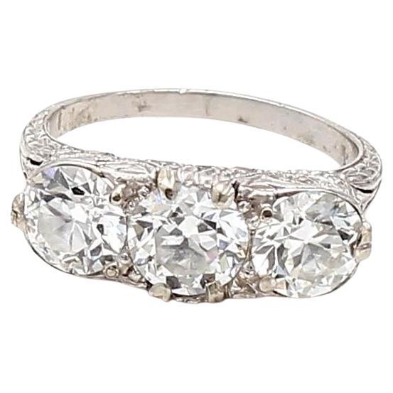 2.39 Carat F-G-H VS Diamond Platinum Three-Stone Antique Circular Cut Ring For Sale