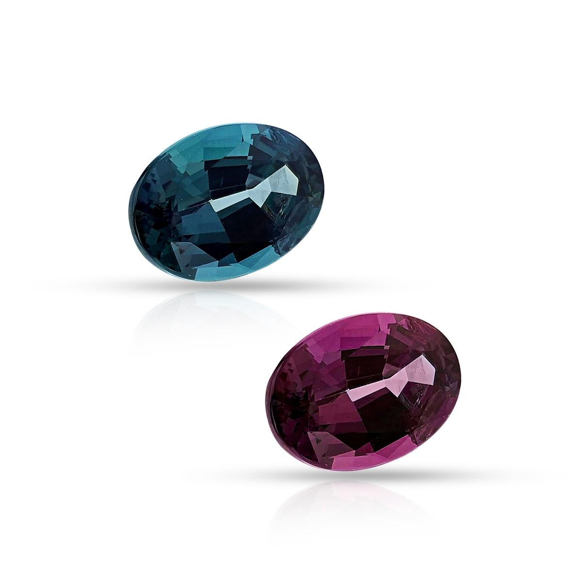 A beautiful and fine-quality oval-shaped mixed-cut Brazilian Alexandrite with 90%-100% (Prominent) Color-Change and Excellent Quality of Color-Change from Blue-Green to Purple-Pink colors. The alexandrite measures 9.72 x 6.85 x 4.67 mm, and it is