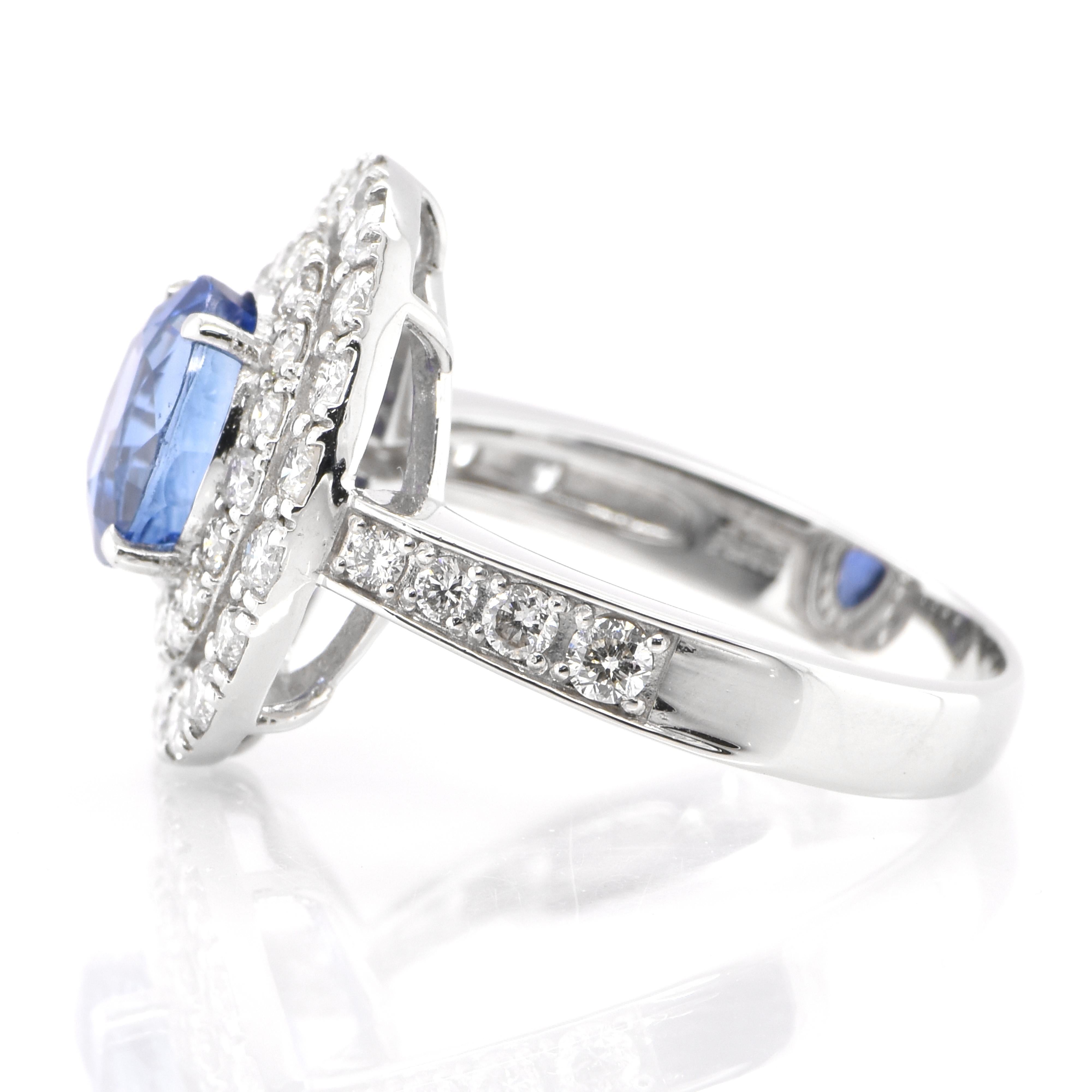 Oval Cut 2.39 Carat Natural Blue Sapphire and Diamond Double Halo Ring Made in Platinum
