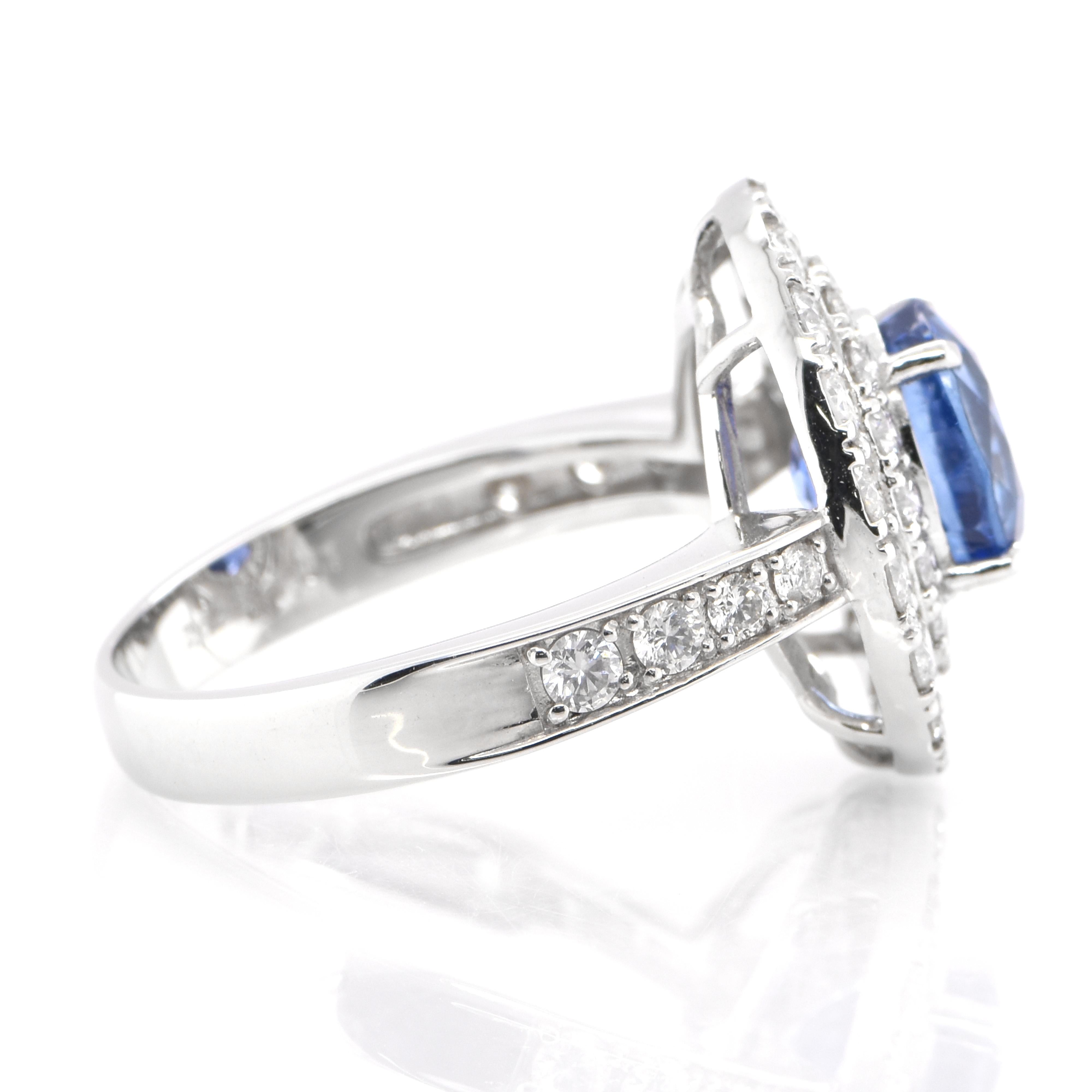 2.39 Carat Natural Blue Sapphire and Diamond Double Halo Ring Made in Platinum In New Condition In Tokyo, JP