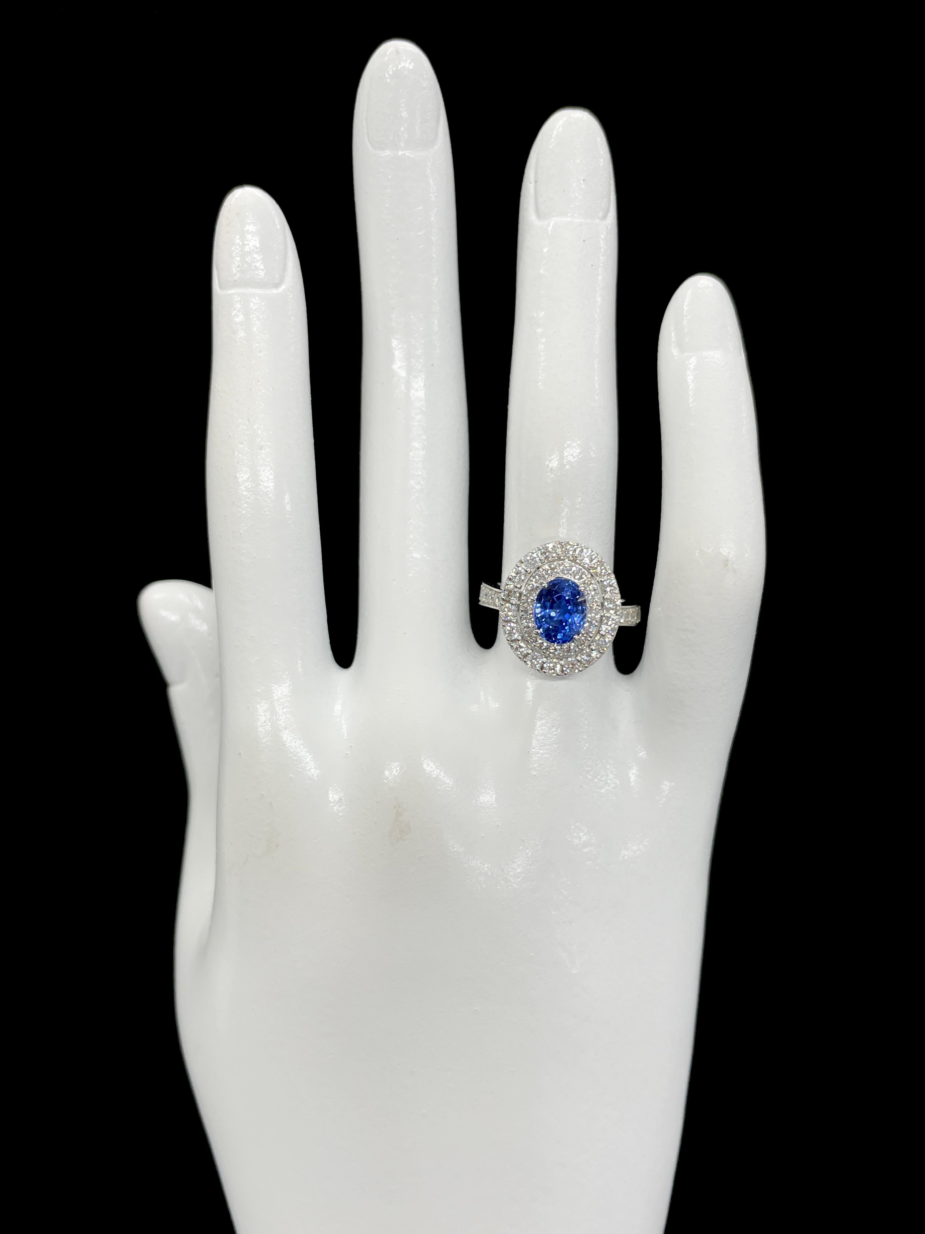 2.39 Carat Natural Blue Sapphire and Diamond Double Halo Ring Made in Platinum 1