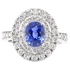 2.39 Carat Natural Blue Sapphire and Diamond Double Halo Ring Made in Platinum