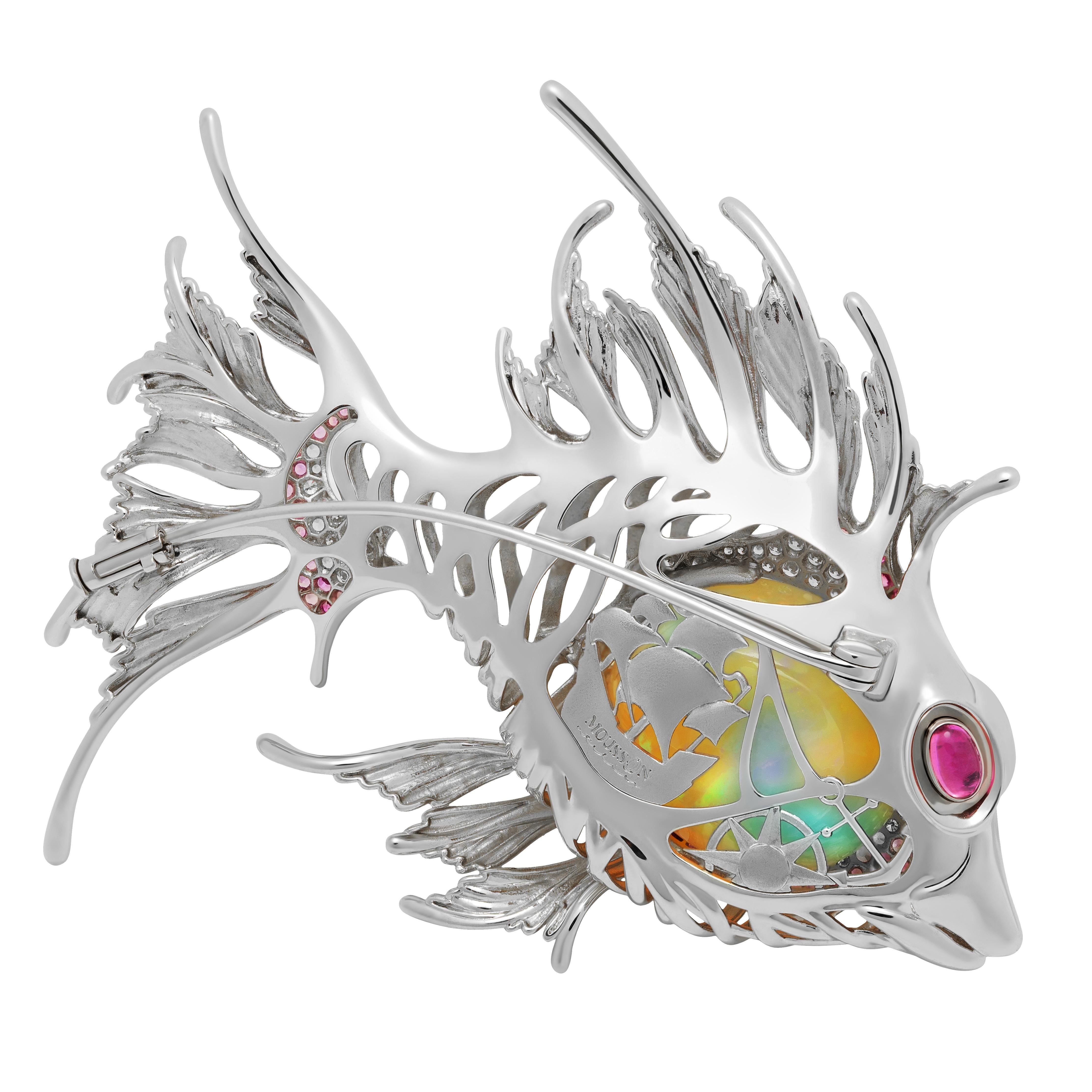 Opal 23.90 Carat, Pink Yellow Sapphire, Diamonds 18 Karat White Gold Fish Brooch

This exquisite Lionfish brooch is crafted from 18-karat white gold and features a stunning body made of 23.90-carat Opal, Pink and Yellow Sapphires and approximately 1