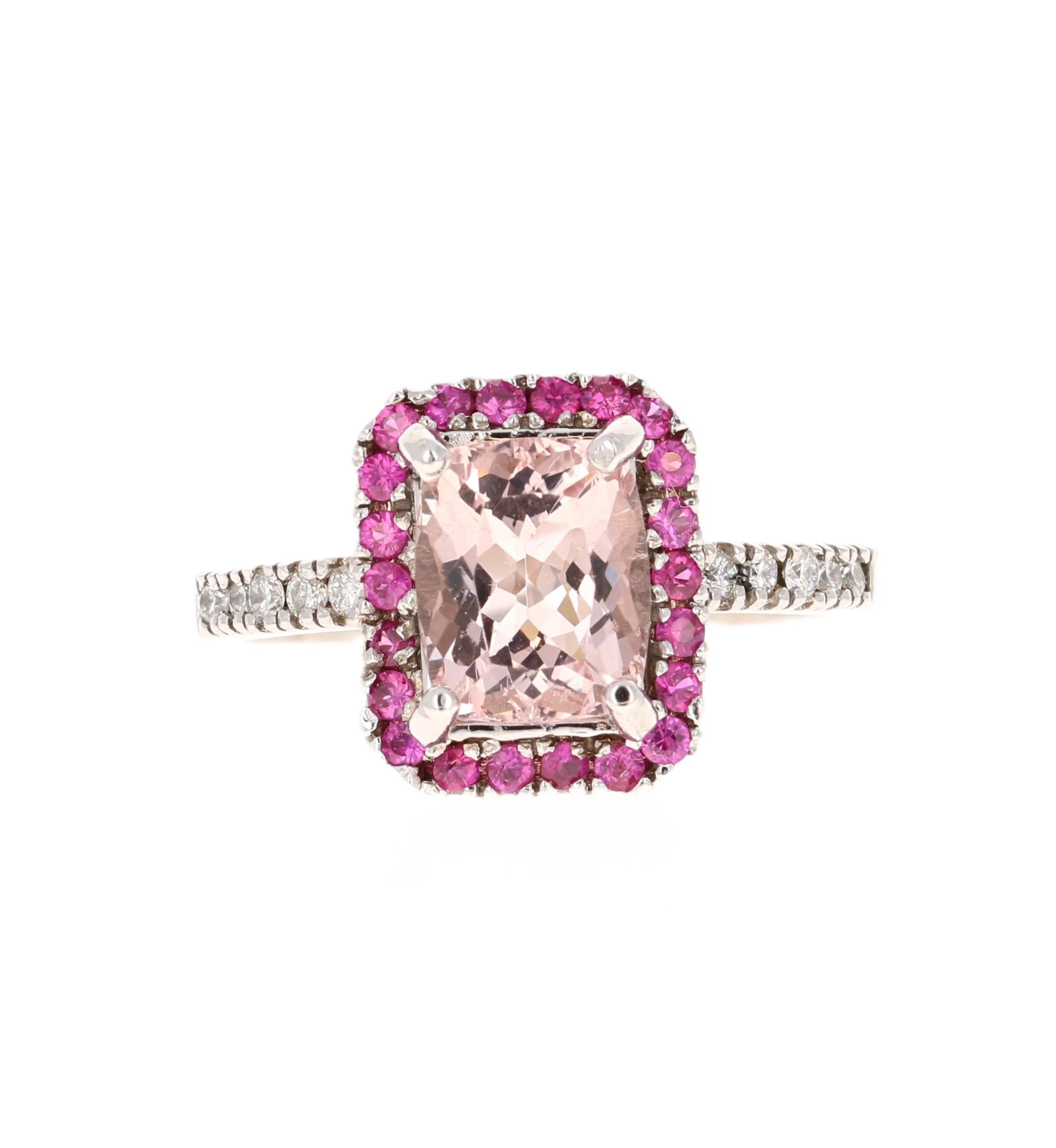 A lovely Engagement Ring Option or as an alternate to a Pink Diamond Ring! 

This gorgeous and classy Morganite and Diamond Ring has a 1.88 Carat Emerald Cut Pink Morganite and is surrounded by a simple halo of 22 Pink Sapphires that weigh 0.36