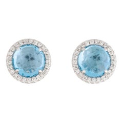 Clous d'oreilles en or blanc avec topaze bleue suisse ronde de 2,39 carats et diamants