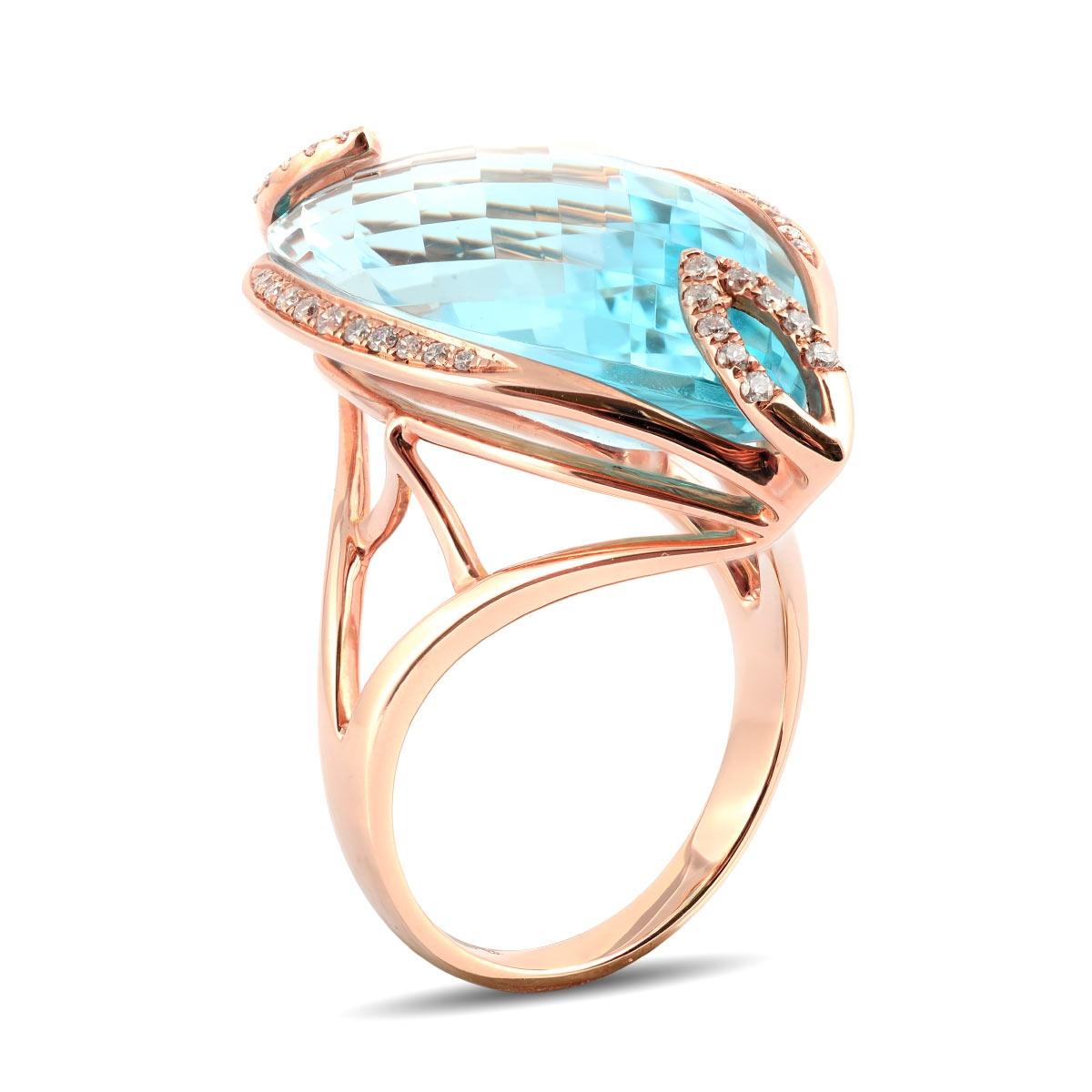 Embracing a radiant sky-blue hue, this marquise-shaped Blue Topaz ring is a charming choice. The gem's cut allows light to create a scintillating display, showcasing its ethereal beauty. Set in rose gold, it finds the perfect complement, while the
