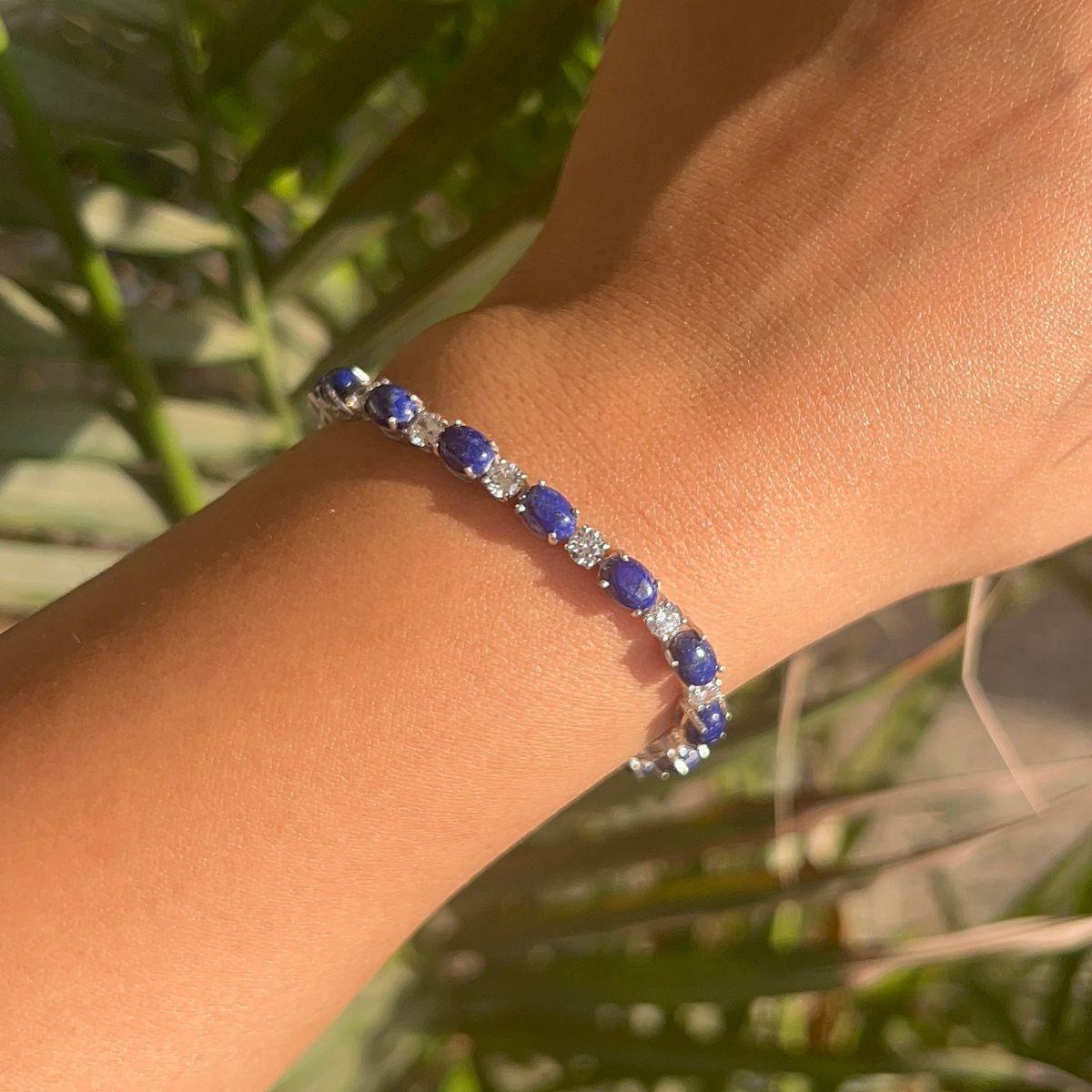 23.95 Ct Oval Cut Lapis Lazuli Prong Set Tennis Bracelet in 925 Sterling Silver. You shall need statement tennis bracelet to make a statement with your look. Each piece features dazzling cubic zirconia stones, renowned for their brilliance and