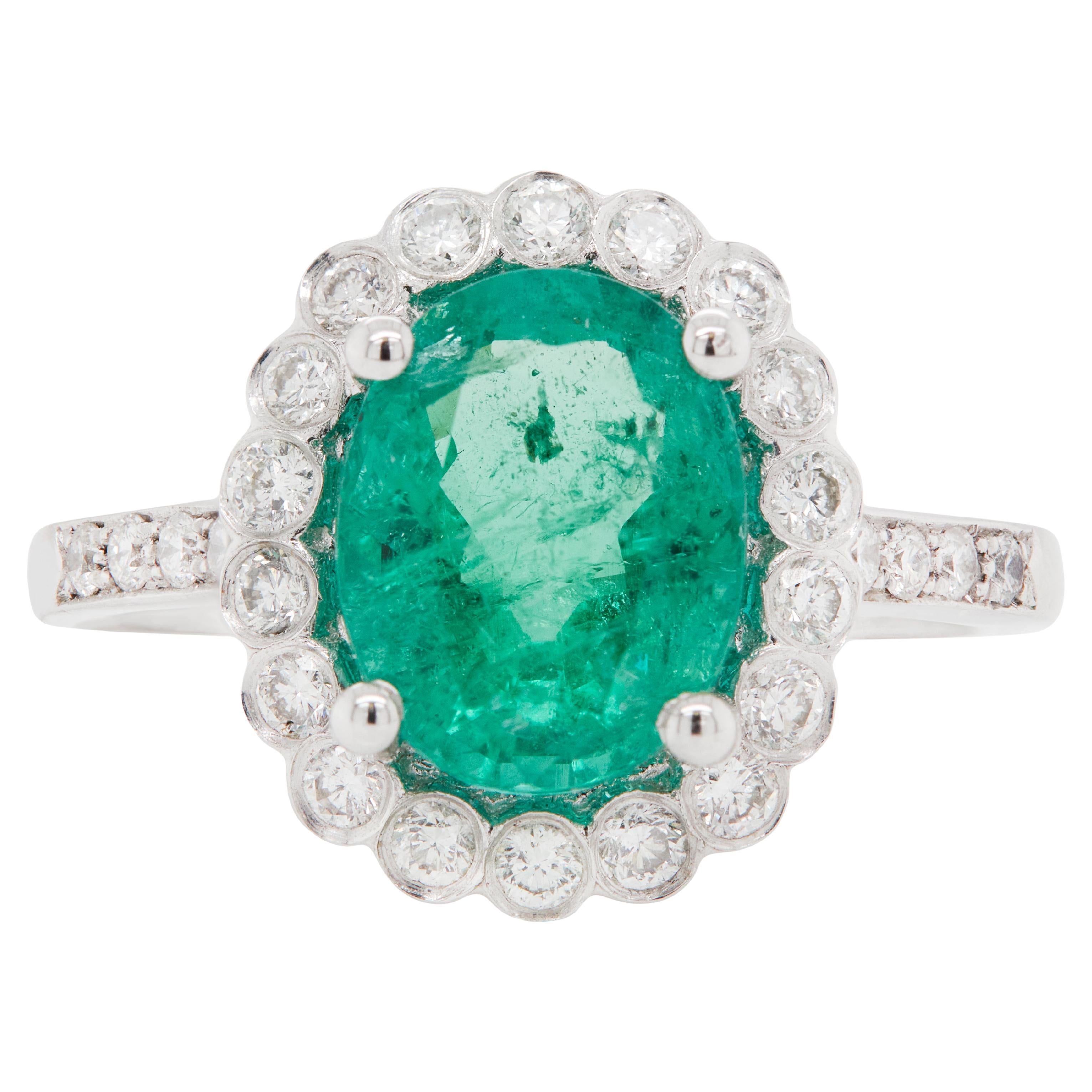 2.39ct Oval Emerald and Diamond Halo 18 Carat White Gold Cluster Engagement Ring