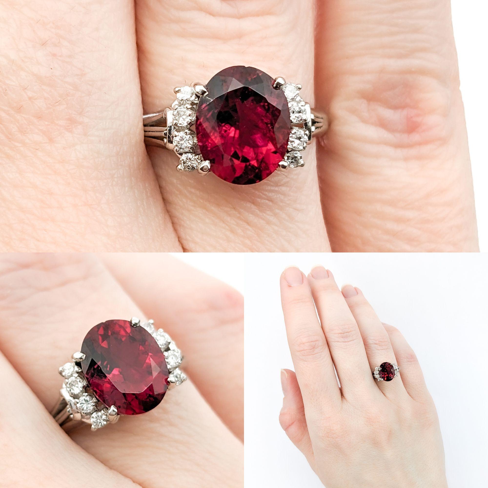 2.39ct Rubellite Tourmaline & Diamond Ring In Platinum

This stunning Tourmaline Ring is finely crafted in 900 Platinum. The centerpiece is a captivating 2.39ct Rubellite Tourmaline, adding a rich pop of pinkish red color. The tourmaline is further