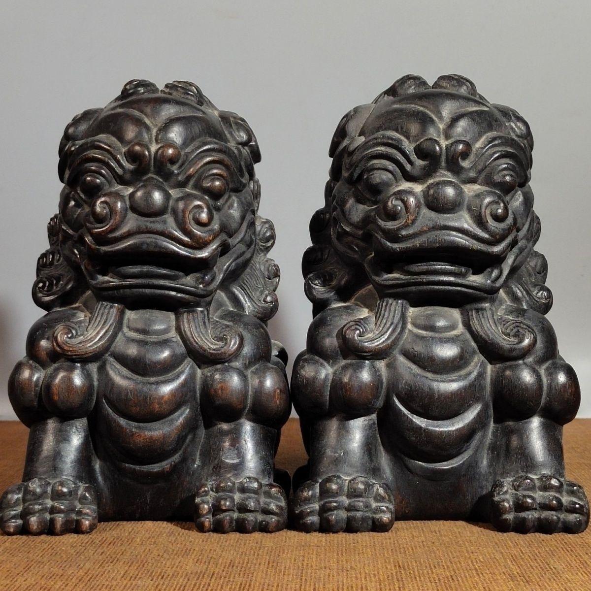 Enhance your space with this Vintage Chinese Auspicious Wood Lions Pair Sculptures, a stunning representation of traditional Chinese artistry and symbolism. Hand-carved from high-quality wood, these guardian lion statues, also known as Foo Dogs,