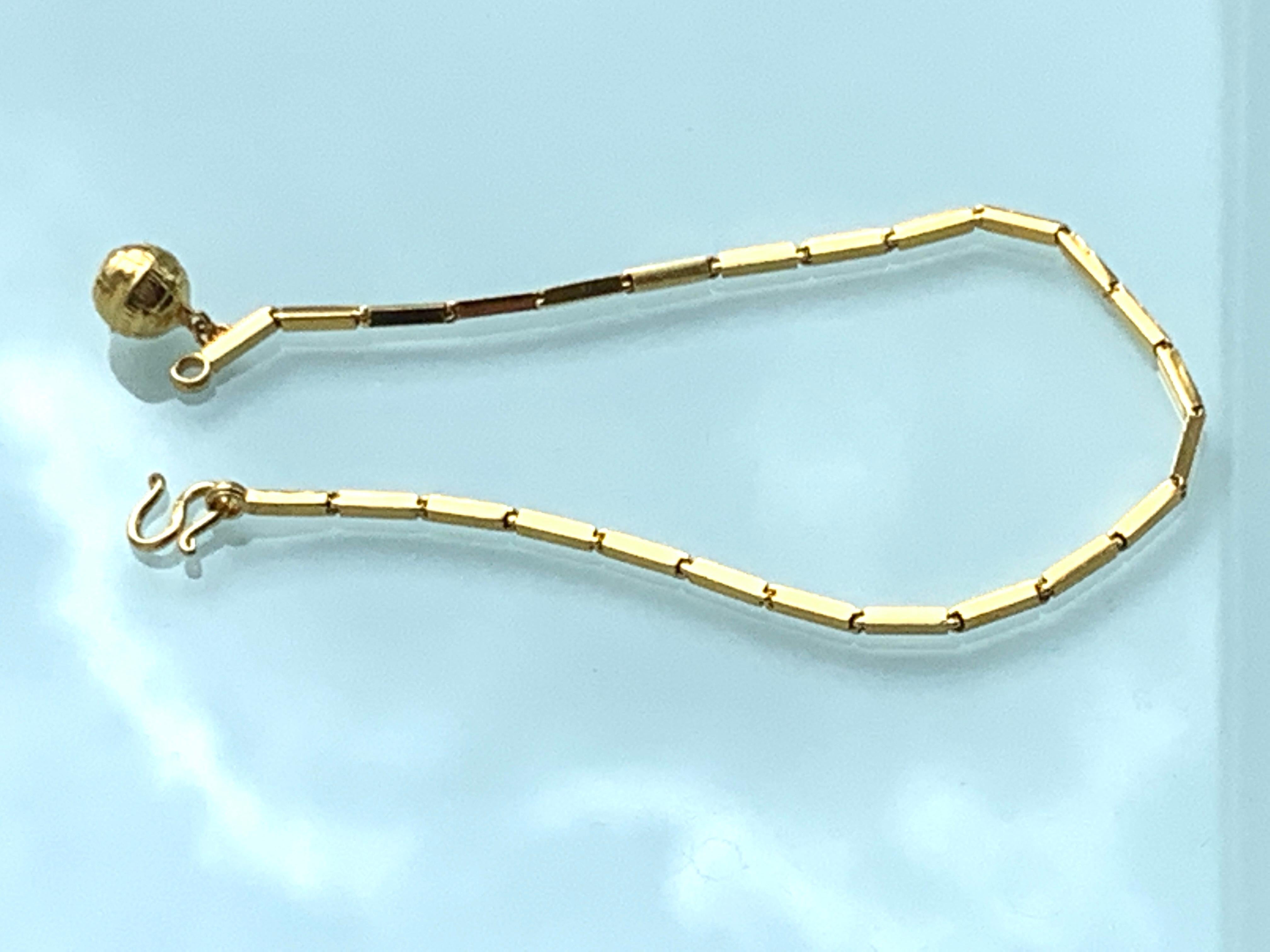 23 Karat Gold Globus-Charm-Armband 1,82 Gramm (Empire)