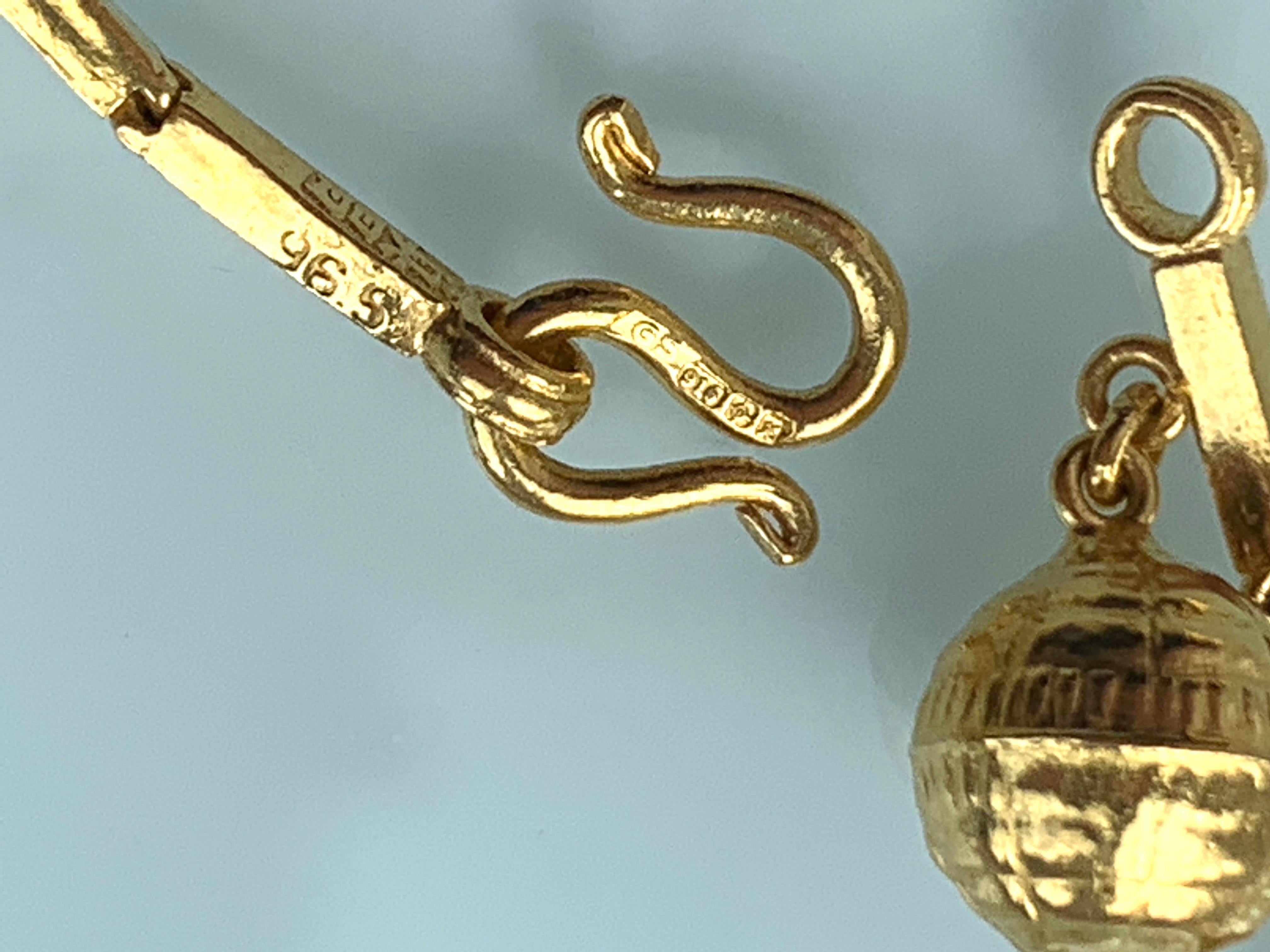 23 Karat Gold Globus-Charm-Armband 1,82 Gramm 1