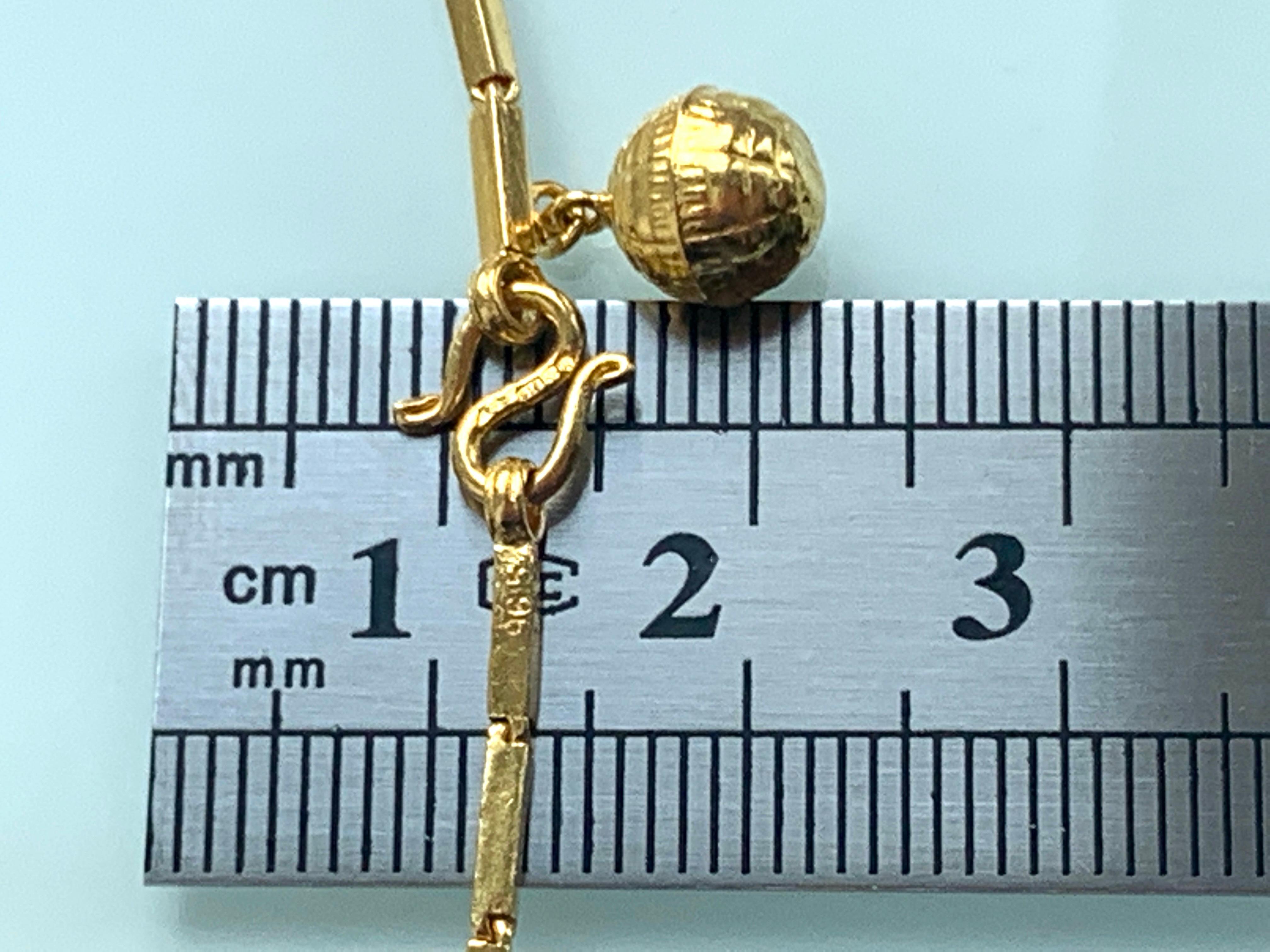 23 Karat Gold Globus-Charm-Armband 1,82 Gramm 3
