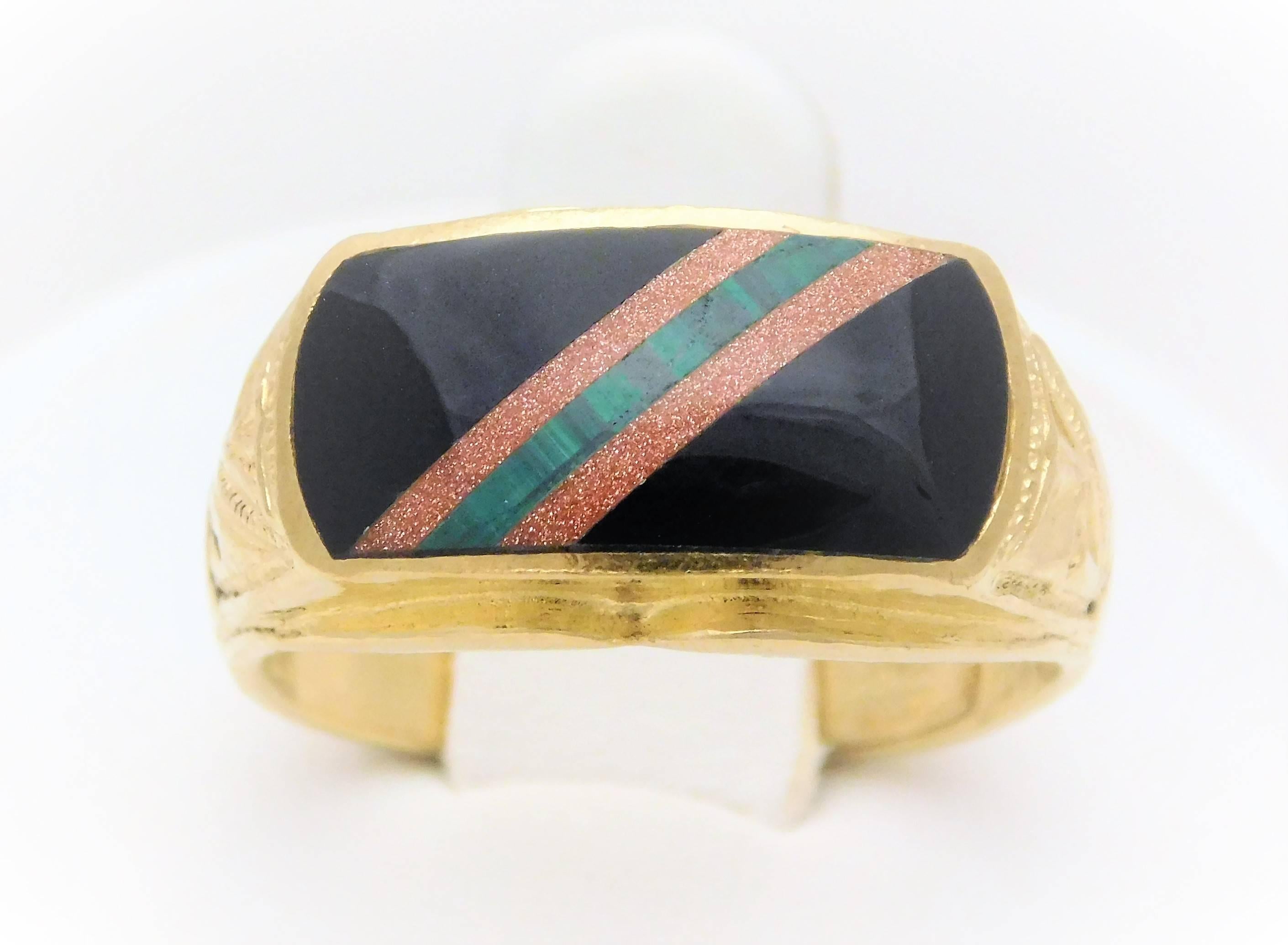 From a Chinese estate.  Circa 1940-1960.  This magnificent ring has been hand crafted in solid 23k yellow gold.  It has been masterfully jeweled with a very unique handmade black onyx cabochon.  By using heat and pressure, this stacked cabochon is