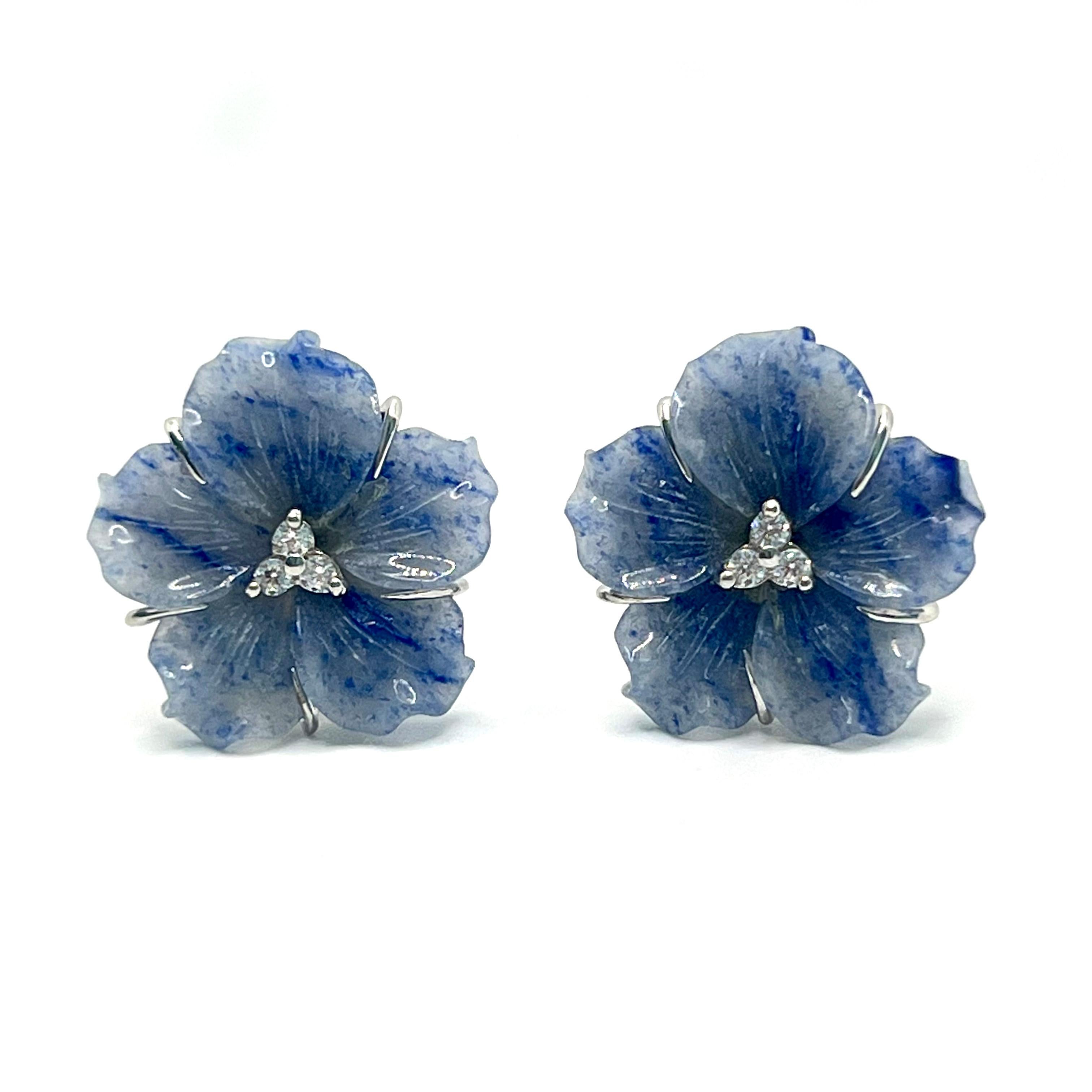 Elegant 23mm Carved Dumortierite Flower Earrings

This gorgeous pair of earrings features 23mm dumortierite carved into beautiful 3D flower, adorned with round simulated diamonds in the center, handset in platinum rhodium plated sterling silver.