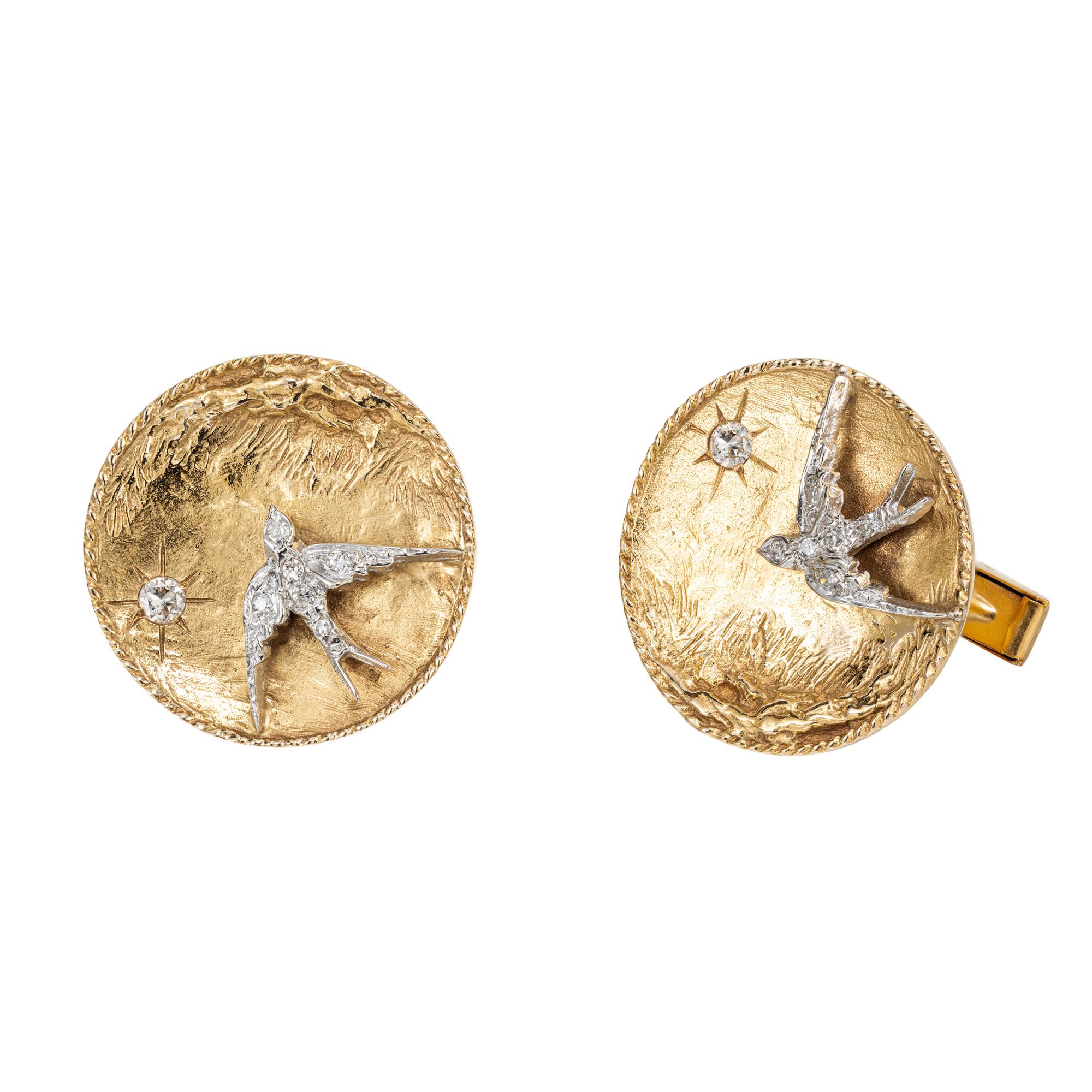 Handmade hand engraved men's diamond cufflinks. These textured, highly detailed 14k yellow gold cufflinks are each adorned with a 14k white gold Swallow bird that consists of 6 round cut diamonds. There is also a single full cut separate diamond on