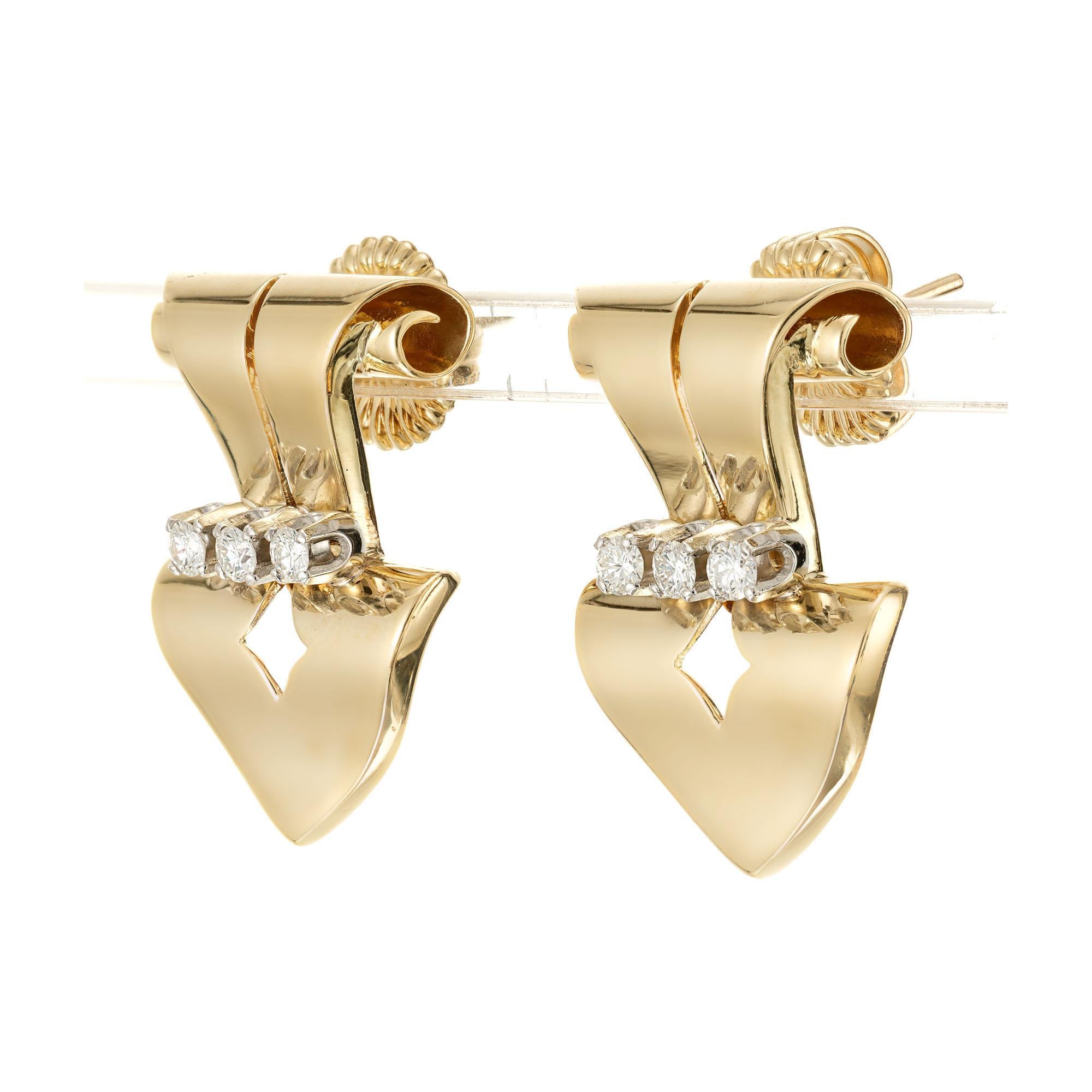 Hand crafted 1940's early modern era ribbon design earrings. 6 round diamonds set in 14k yellow gold ribbon style earrings. 

6 round diamonds, G VS approx. .24cts
14k yellow gold
9.3 grams
Top to bottom: 24.4mm or 1 Inch
Width: 17.4mm 
Depth or