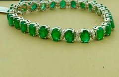 24 Carat Emerald 1.8 Carat Diamond Tennis Bracelet 14 Karat White Gold, 16.7 GM