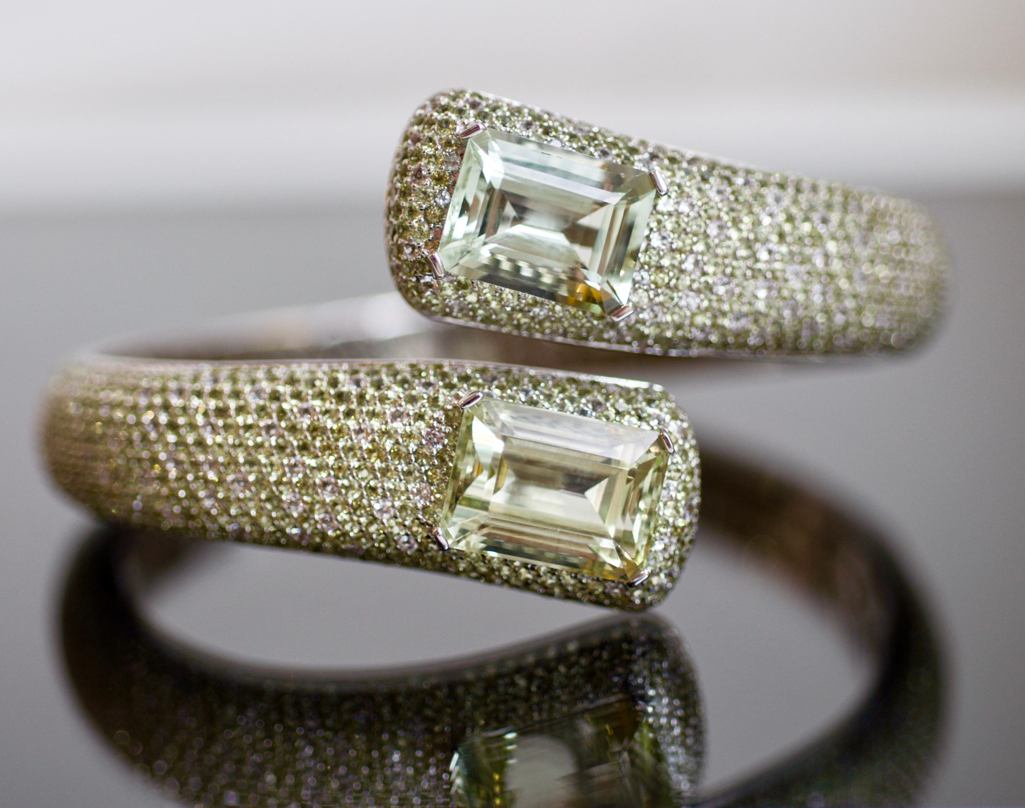 This cuff bracelet belongs to our High Jewelry Collection.
Two intense green amethysts, about 1600 pieces small peridots and white topazes make this bracelet unique and one of a kind jewelry.
No matter where do you plan to go - to Cannes film