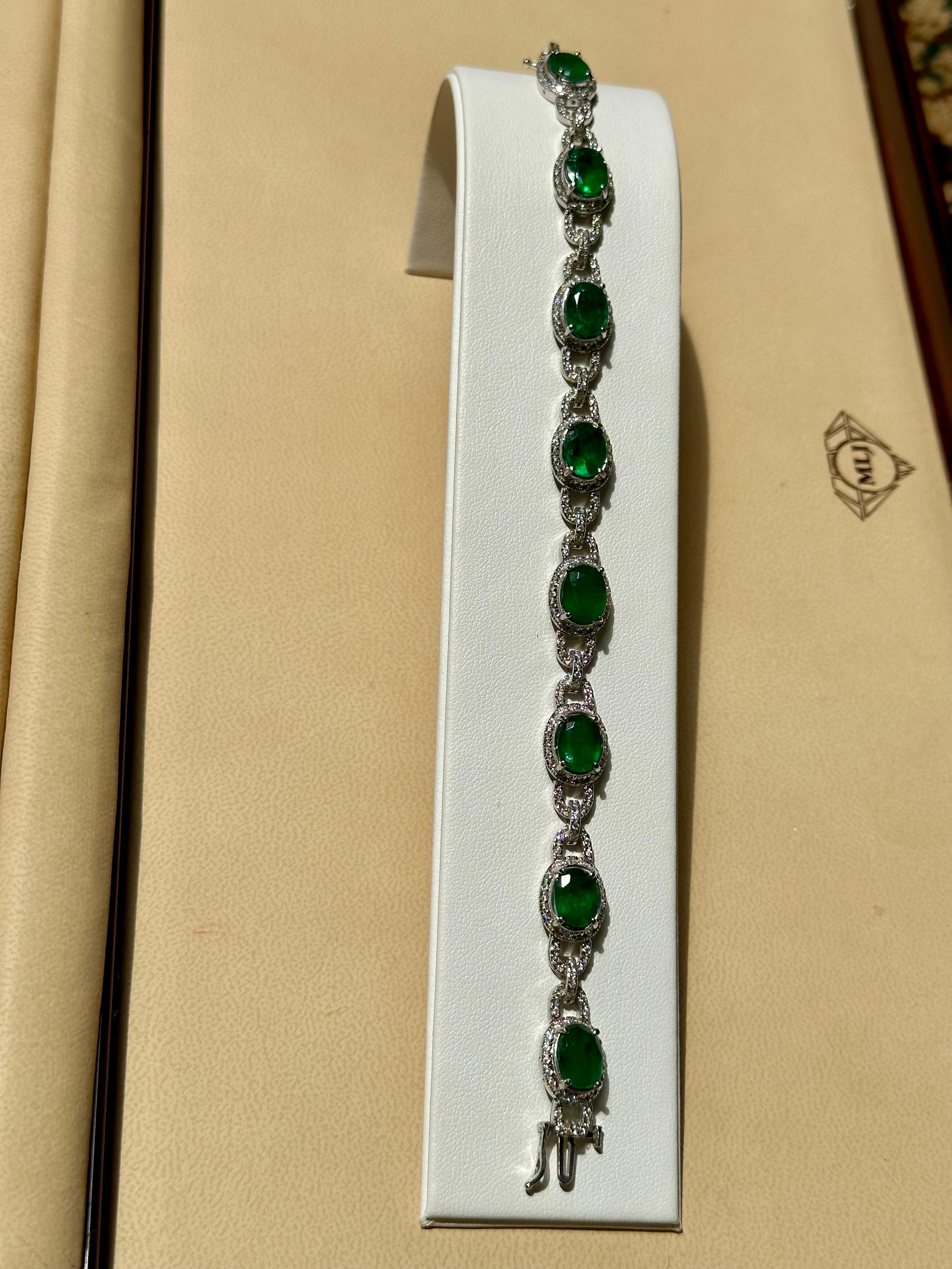 24 Carat Natural Brazilian Emerald & Diamond Link Tennis Bracelet 14 Karat Gold
 This exceptionally affordable Tennis  bracelet has  8 stones of oval  Emeralds  . Each Emerald is spaced by two links of diamonds . Total weight of the Emeralds is 