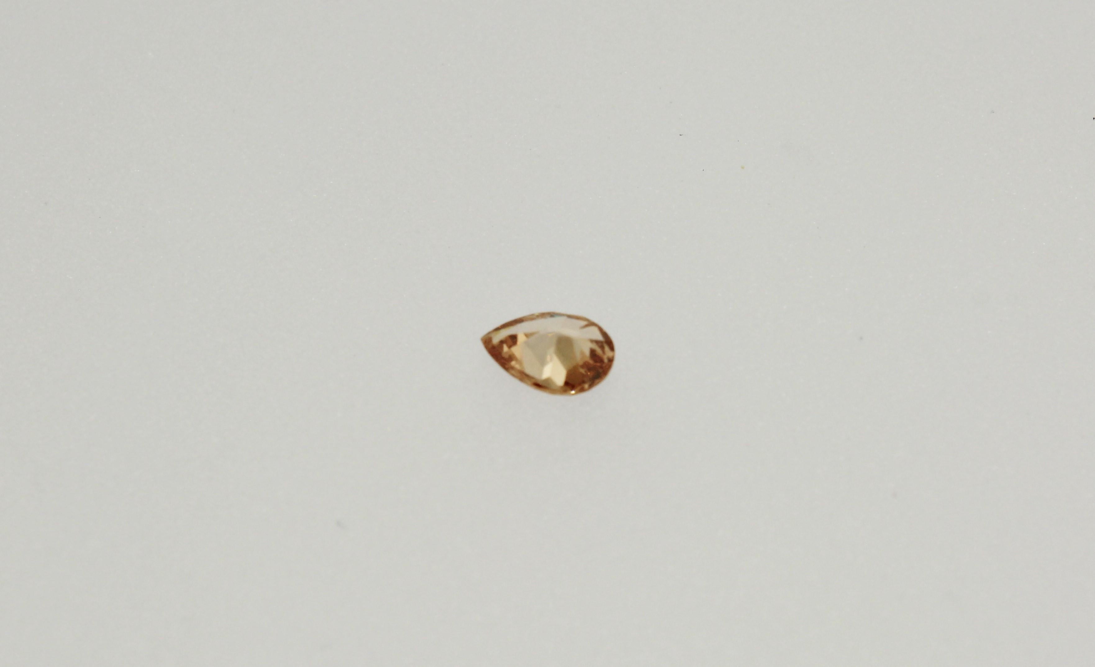 .24 Carat Natural Fancy Deep Brownish Yellowish Orange Pear Shape Diamond with GIA lab report #2141431316.  This diamond has a beautiful tone in its color and will make a great center stone or accent diamond for a larger center stone.  The I1