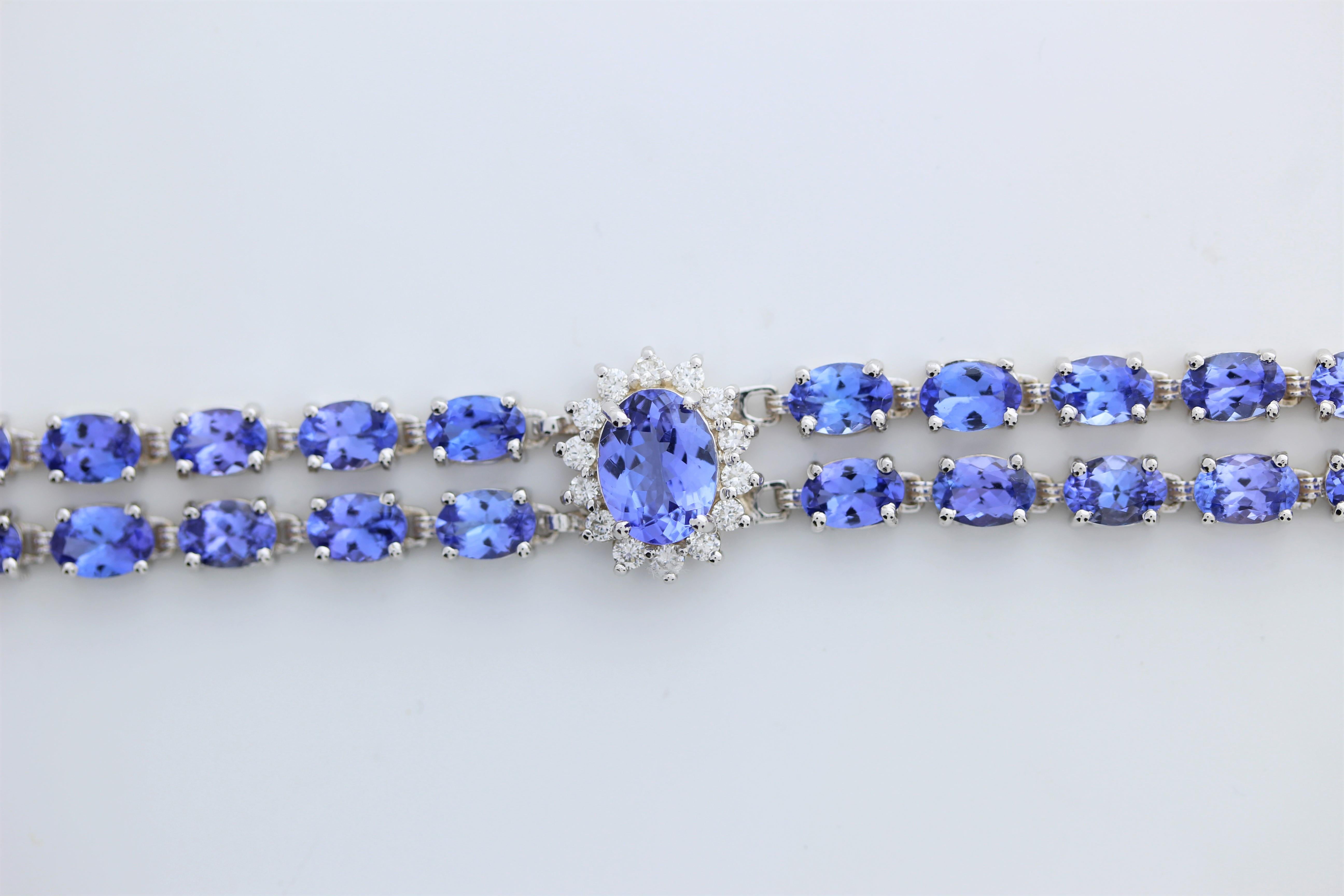 The fashion bracelet features tanzanite gemstones with a total weight of 24 carats, set in 18 karat white gold. The bracelet is accented by a total of 42 round-cut diamonds with a combined weight of 1.5 carats. The combination of tanzanite's unique