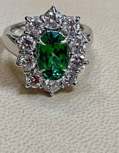 2.4 Carat Oval Tsavorite & 2 Carat Diamond in 18 Karat White Gold Ring Estate