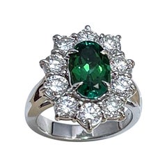 2.4 Carat Oval Tsavorite & 2 Carat Diamond in 18 Karat White Gold Ring Estate