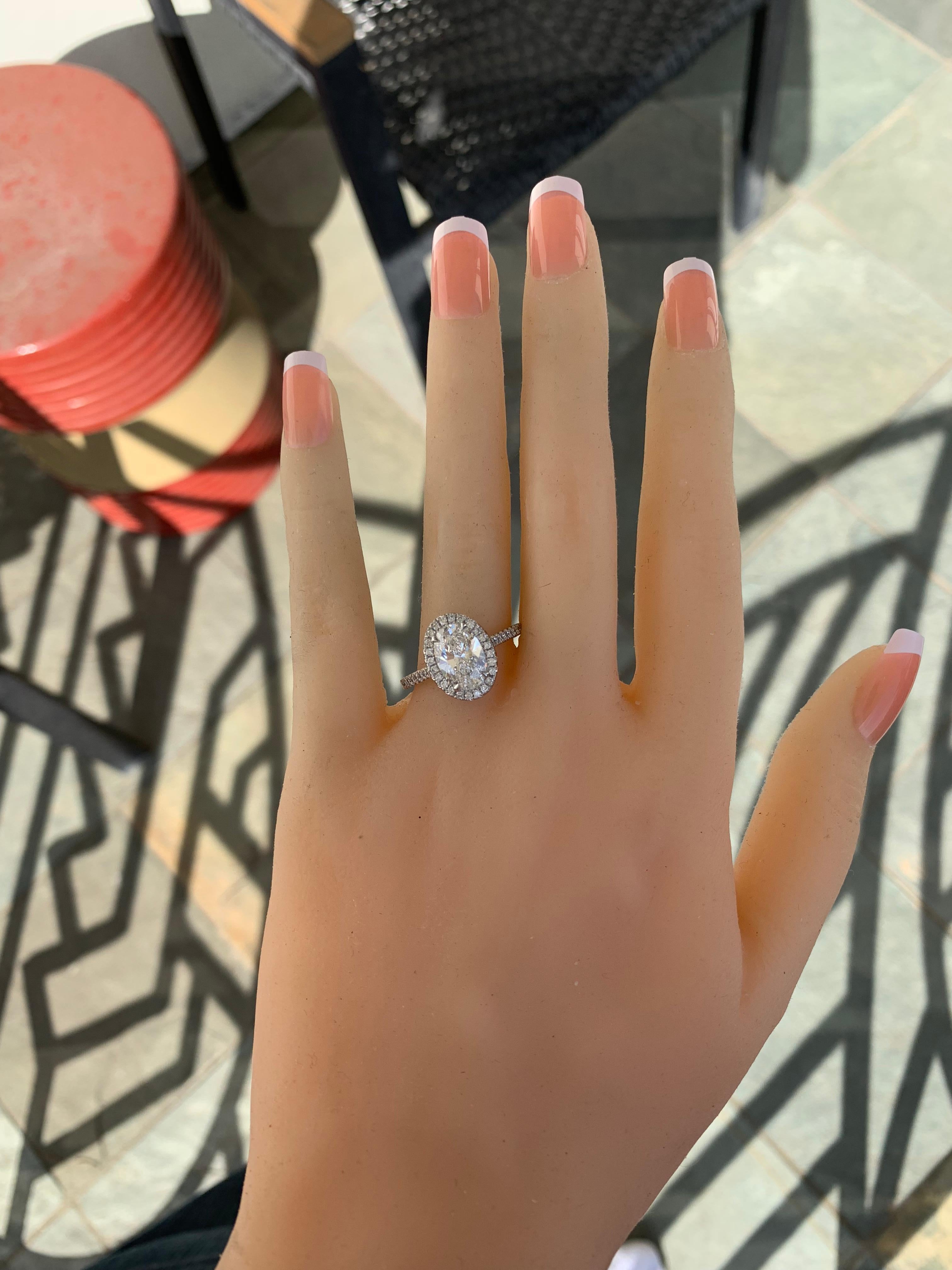 oval micro pave halo engagement ring