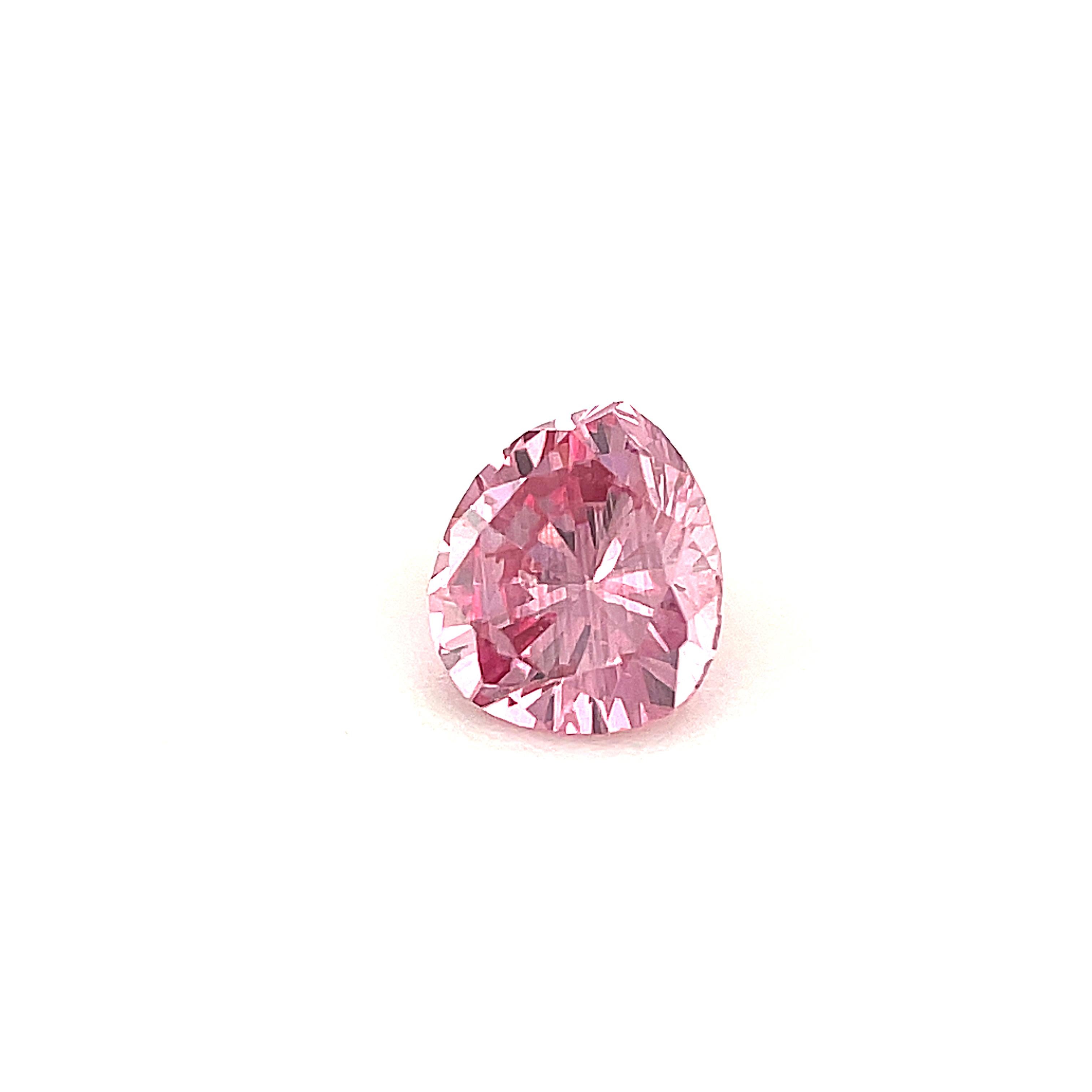 This extremely rare, natural pink diamond weighs .24 carat and is accompanied by a Gemological Institute of America (GIA) Colored Diamond Grading Report stating its color as 