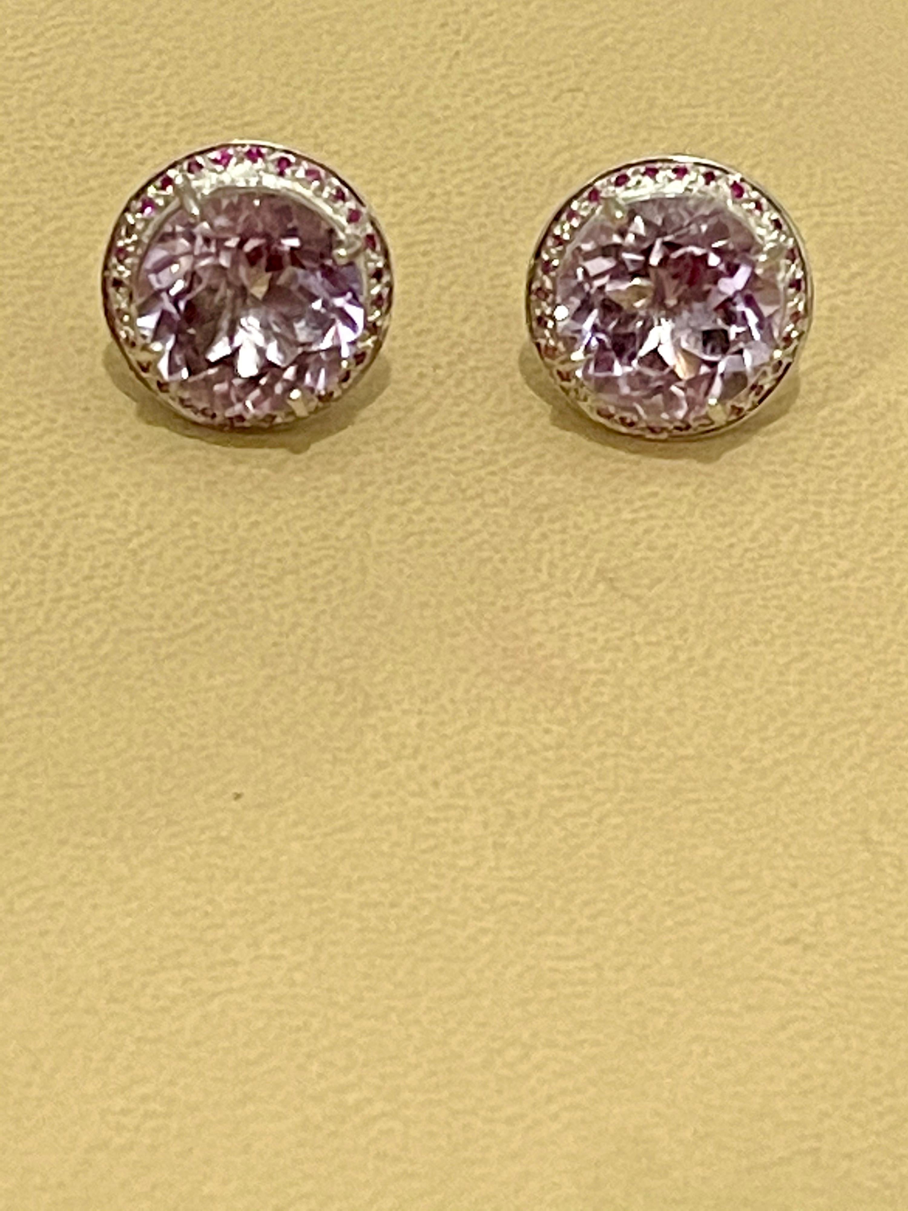 approximately 24 Ct Round Natural  Pink Amethyst Earrings 18 Karat White Gold  Post Backs
The 18k gold case is accented with few round cut Rubies. This is a unique piece  and adds a touch of class to any outfit.
amazing quality of stones.
18-karat